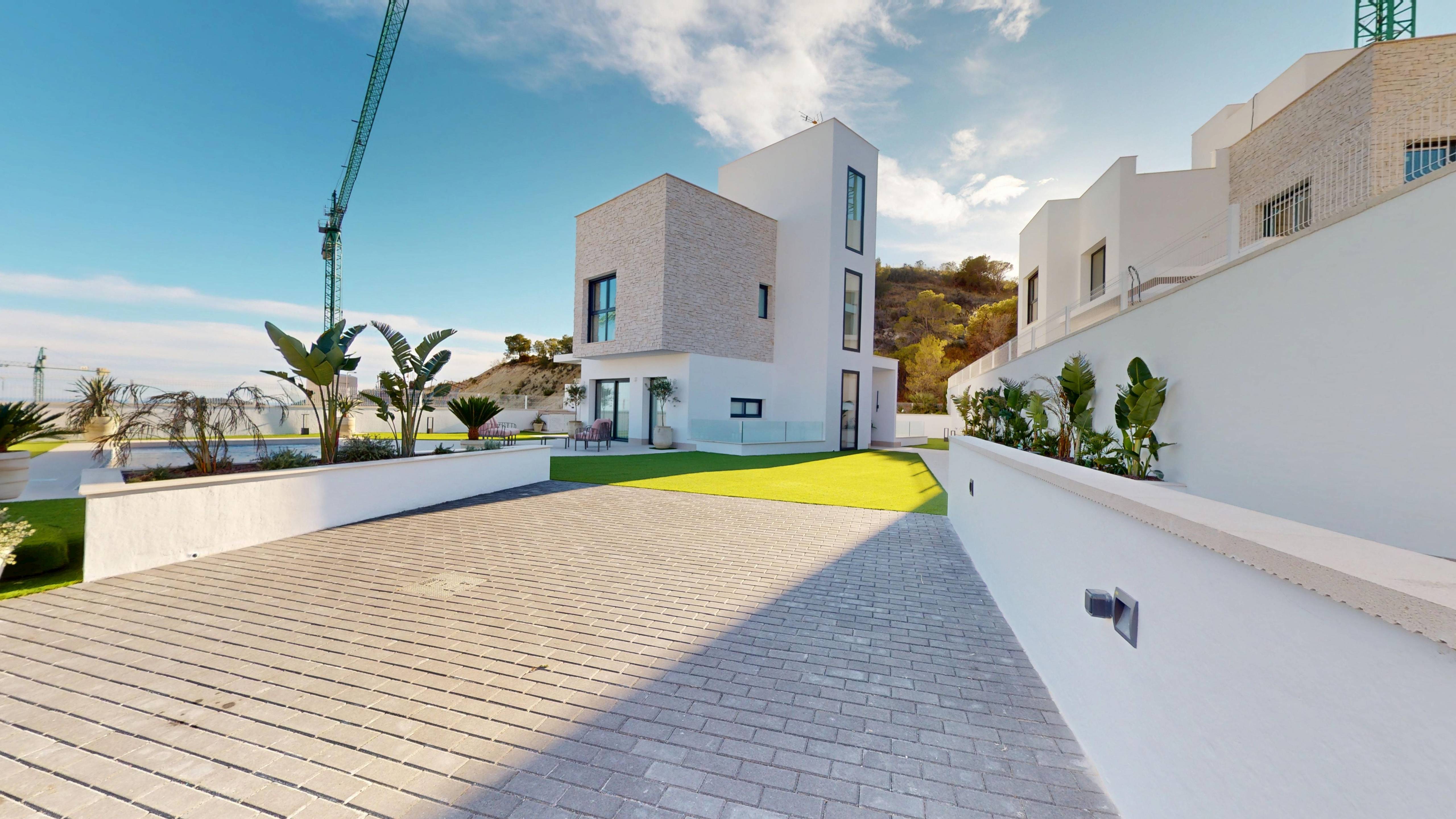 Evening exterior view of new-build villa, Balcón de Finestrat