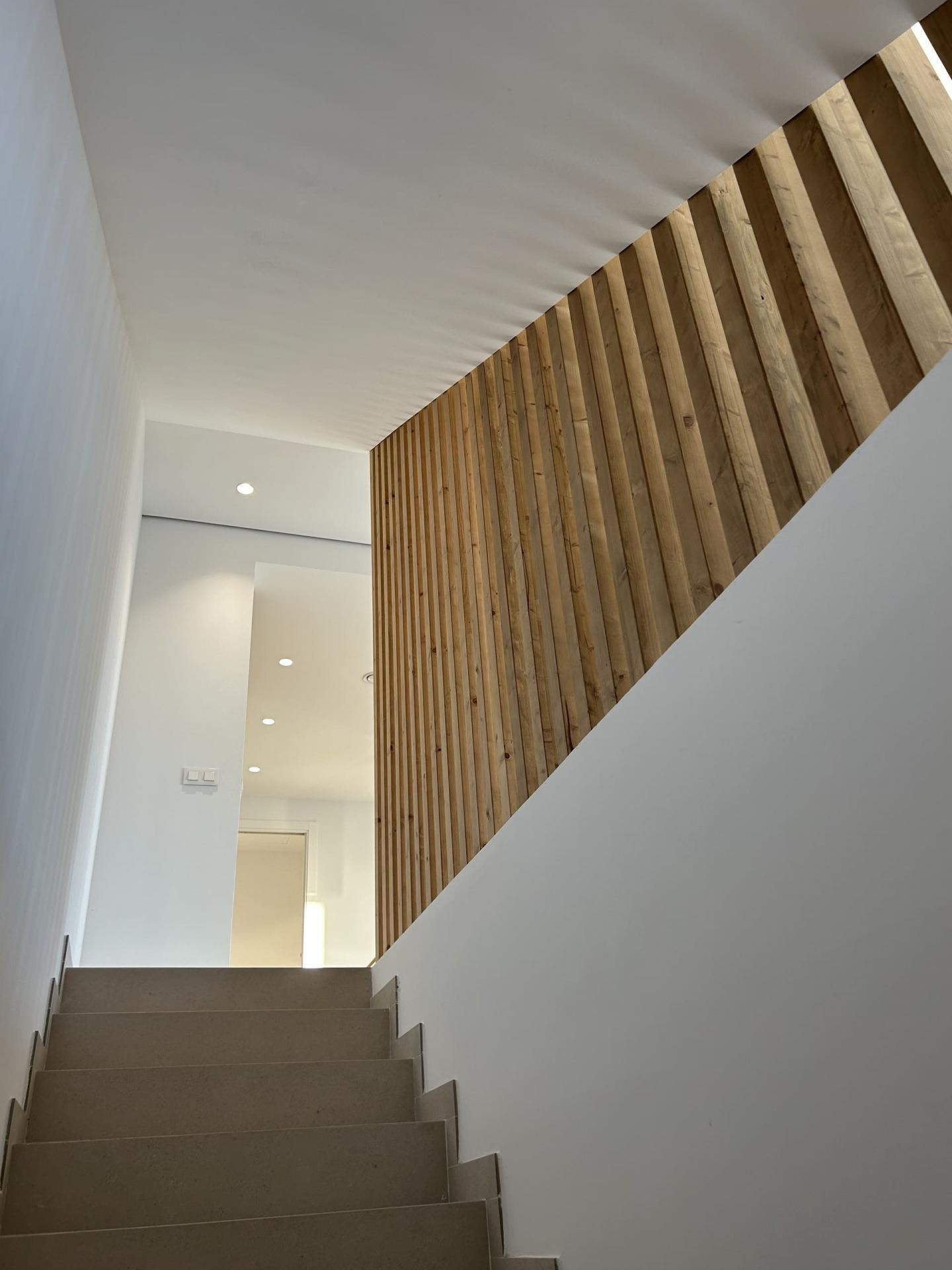 Interior room with large-format tiled flooring and natural light, Finestrat Hills villa