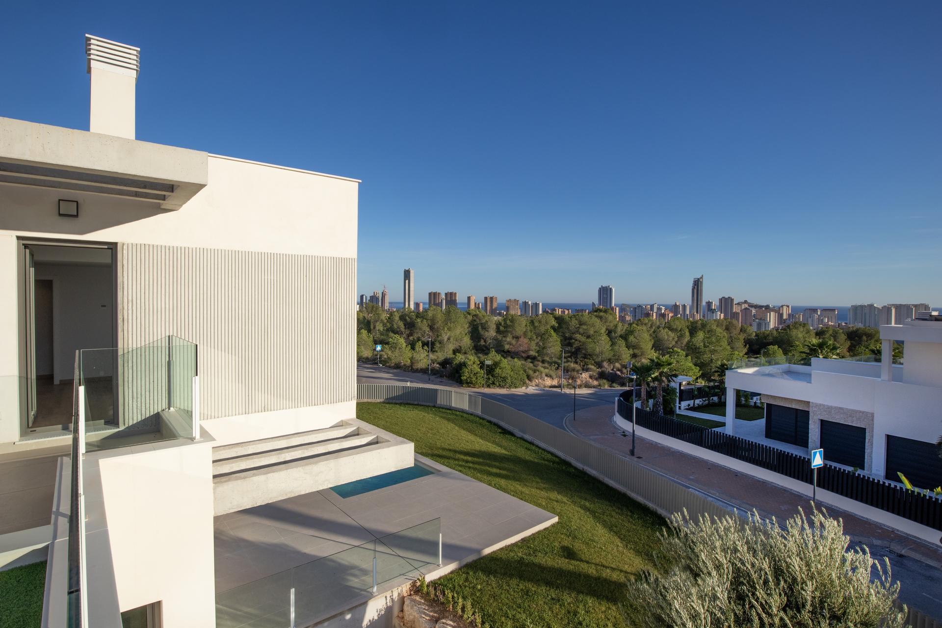 Elevated view across 547m2 villa plot and surrounding hillside, Finestrat Hills