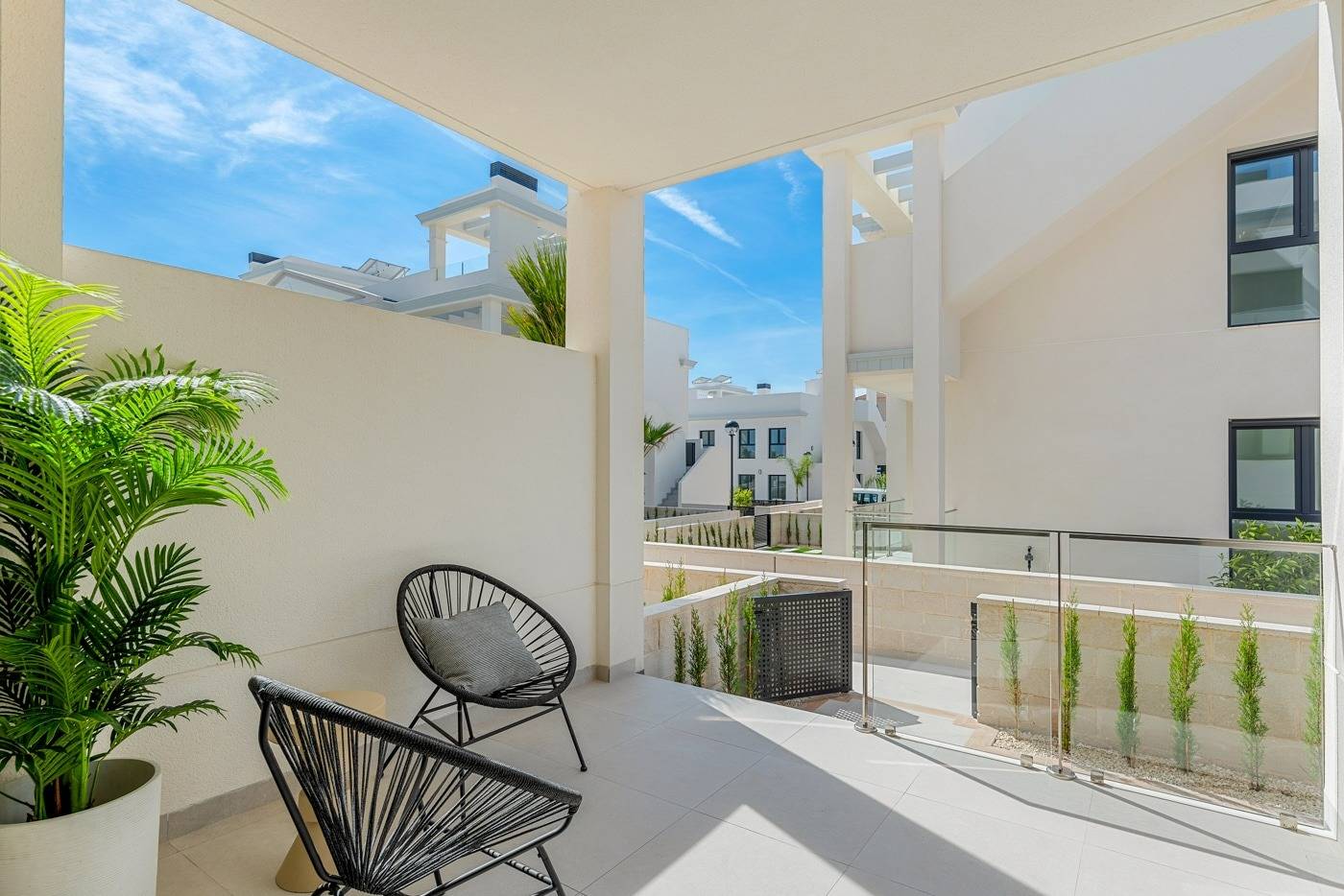 Allocated parking bays, new-build villa complex, Pueblo Bravo