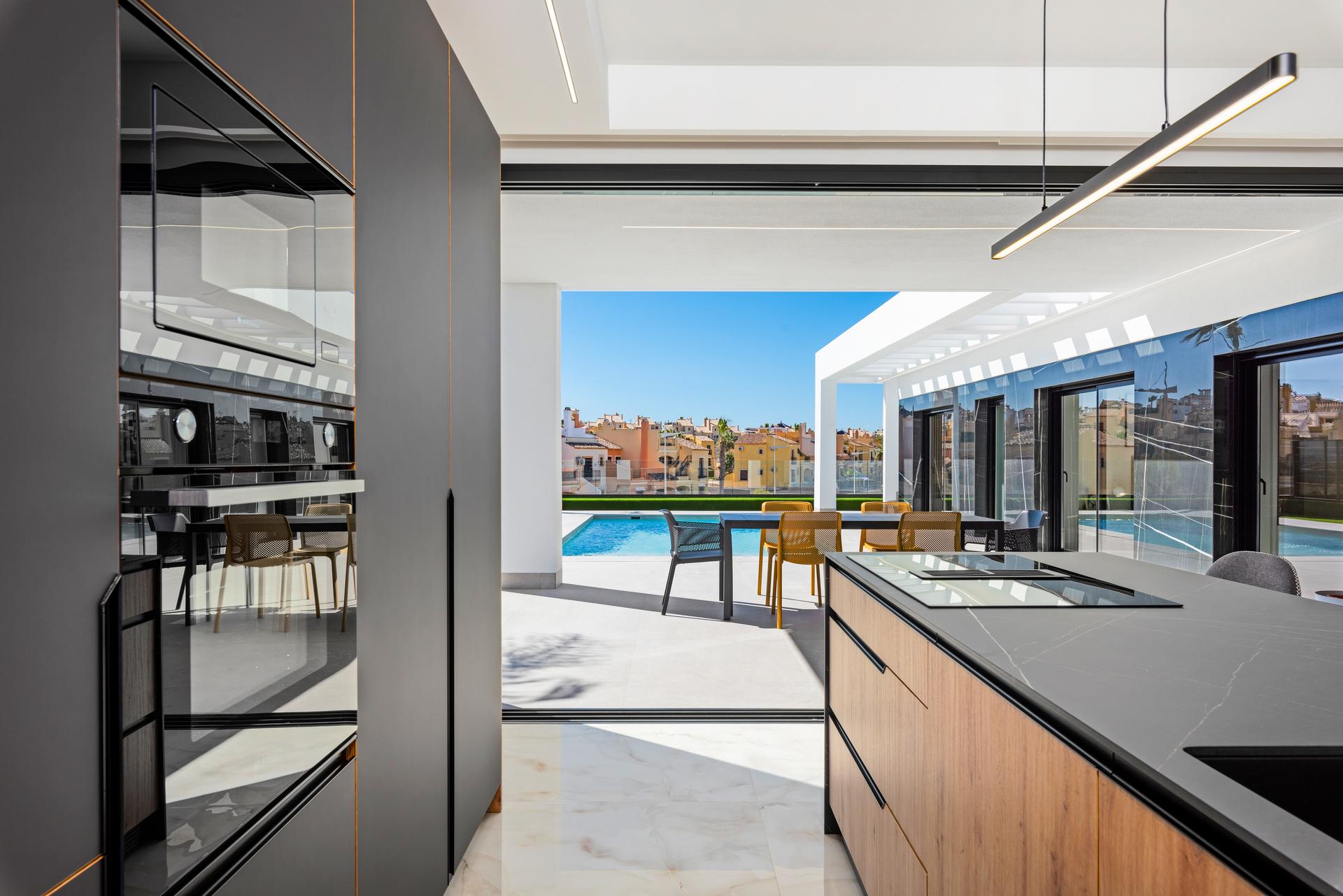 Street setting of new-build villa in Algorfa
