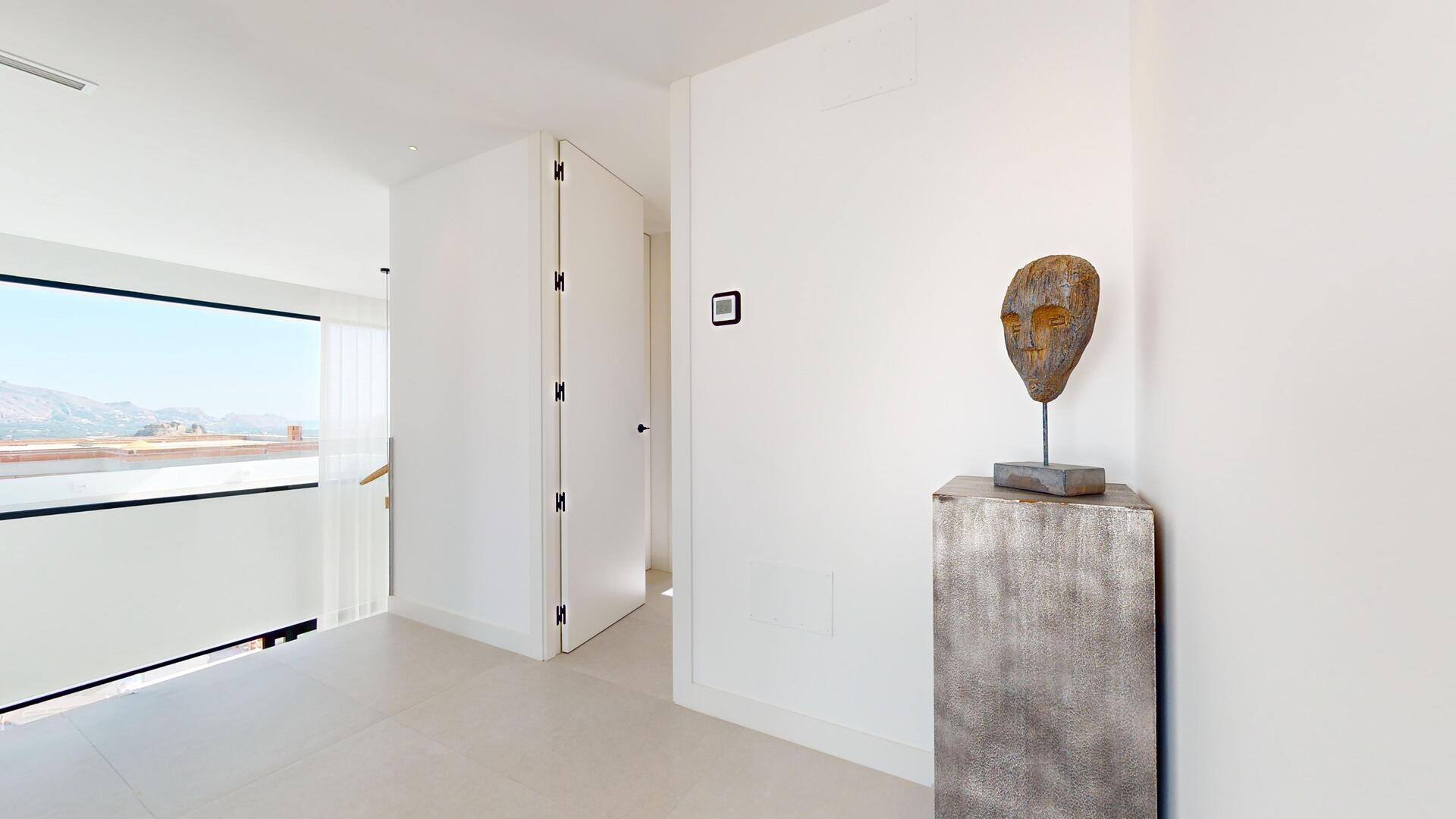 Dining area adjacent to living space in new-build villa, Pla de Cantal, Polop