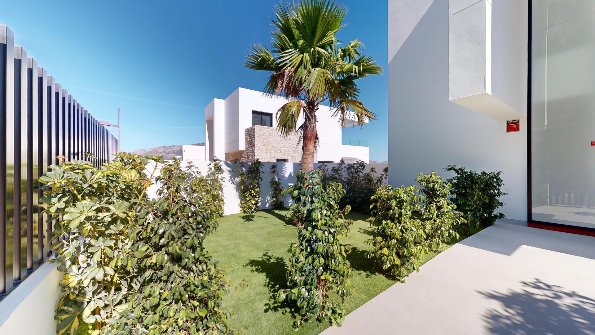 Roofline of new-build villa against clear sky, Pla de Cantal, Polop