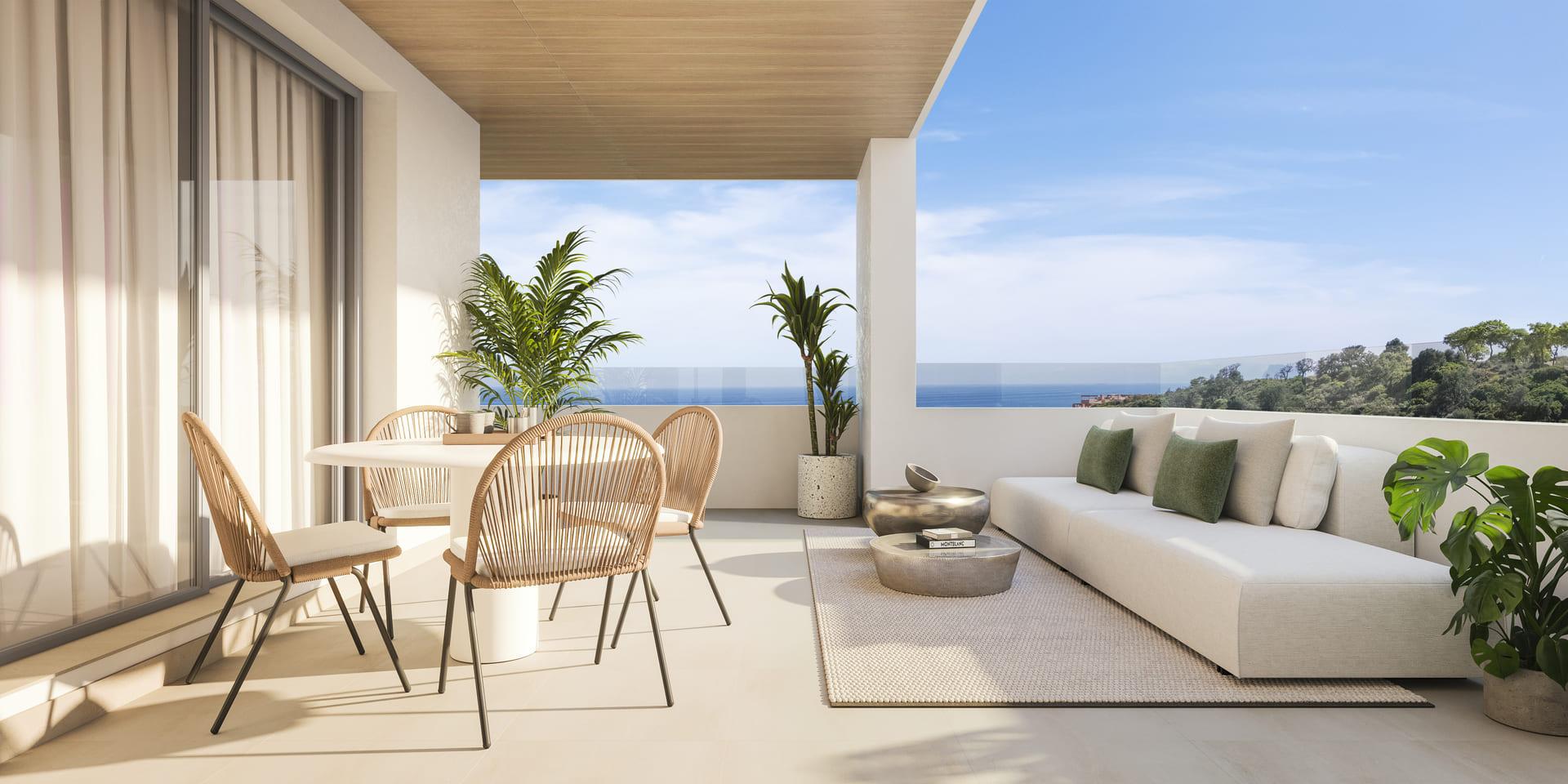 Communal pool with surrounding sun terrace at Bahia de las Rocas development, Manilva