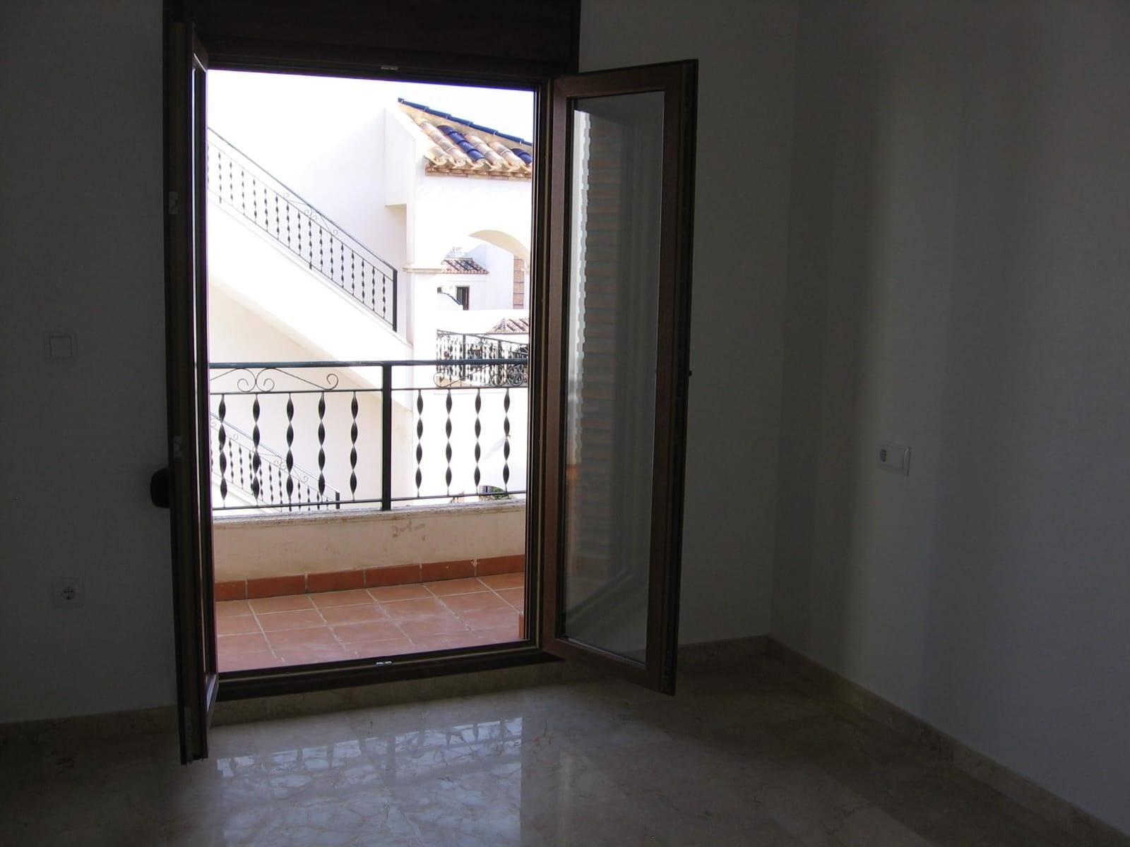 Street-level view of residential complex in PAU 8, Orihuela Costa