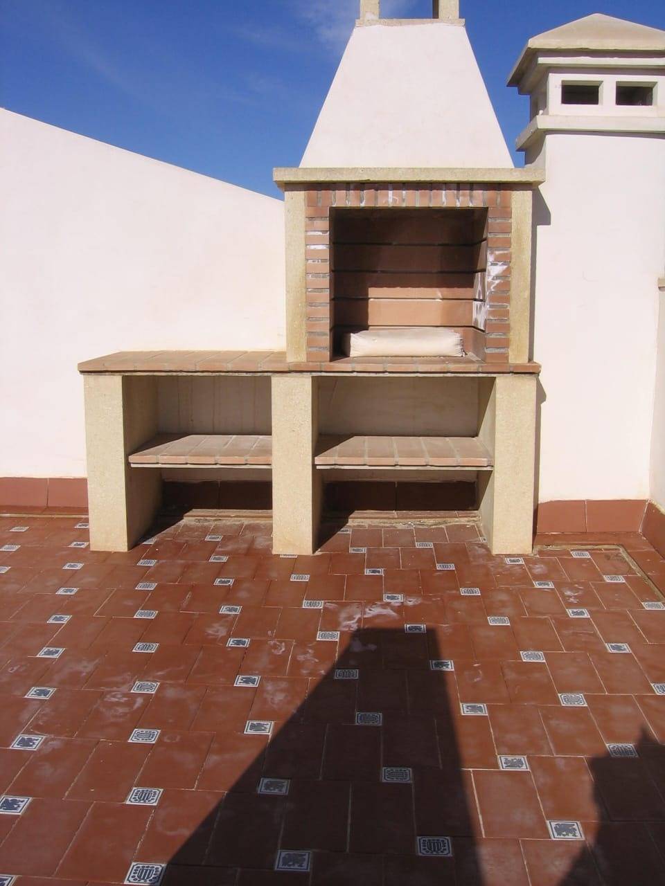 Utility area with plumbing connections in duplex, PAU 8