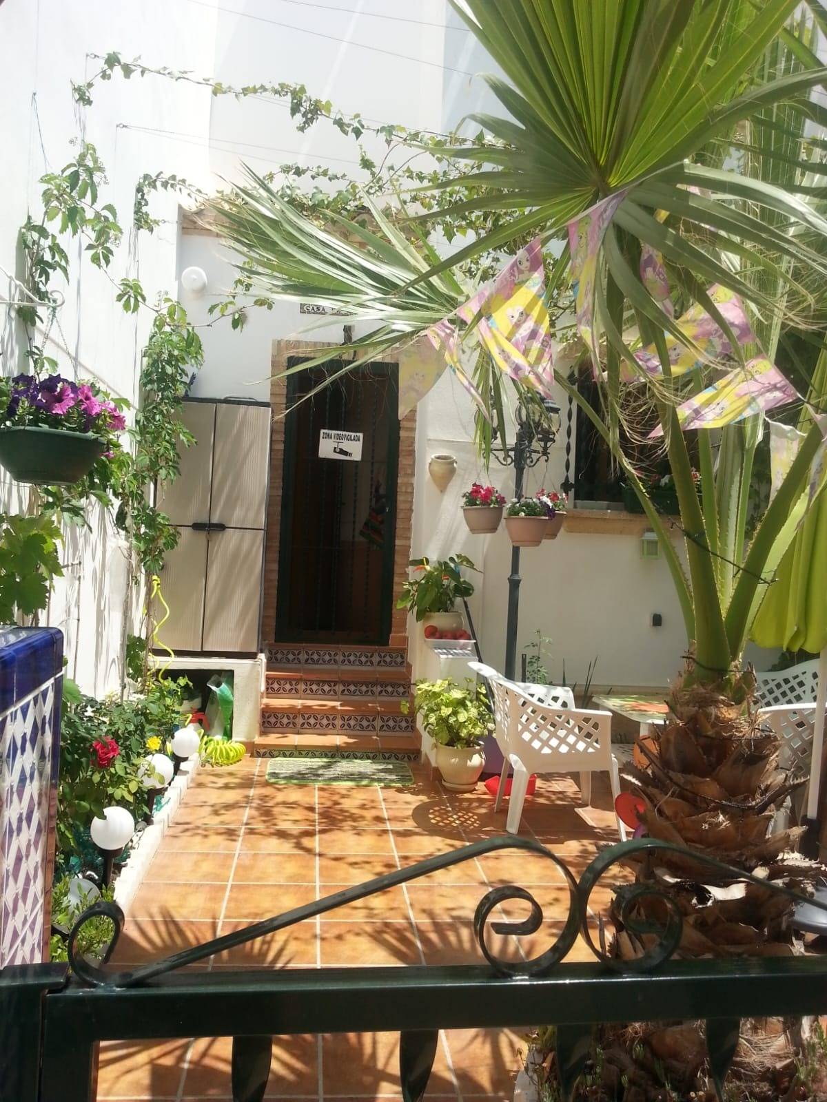 Living room with fireplace in 1-bedroom duplex, PAU 8