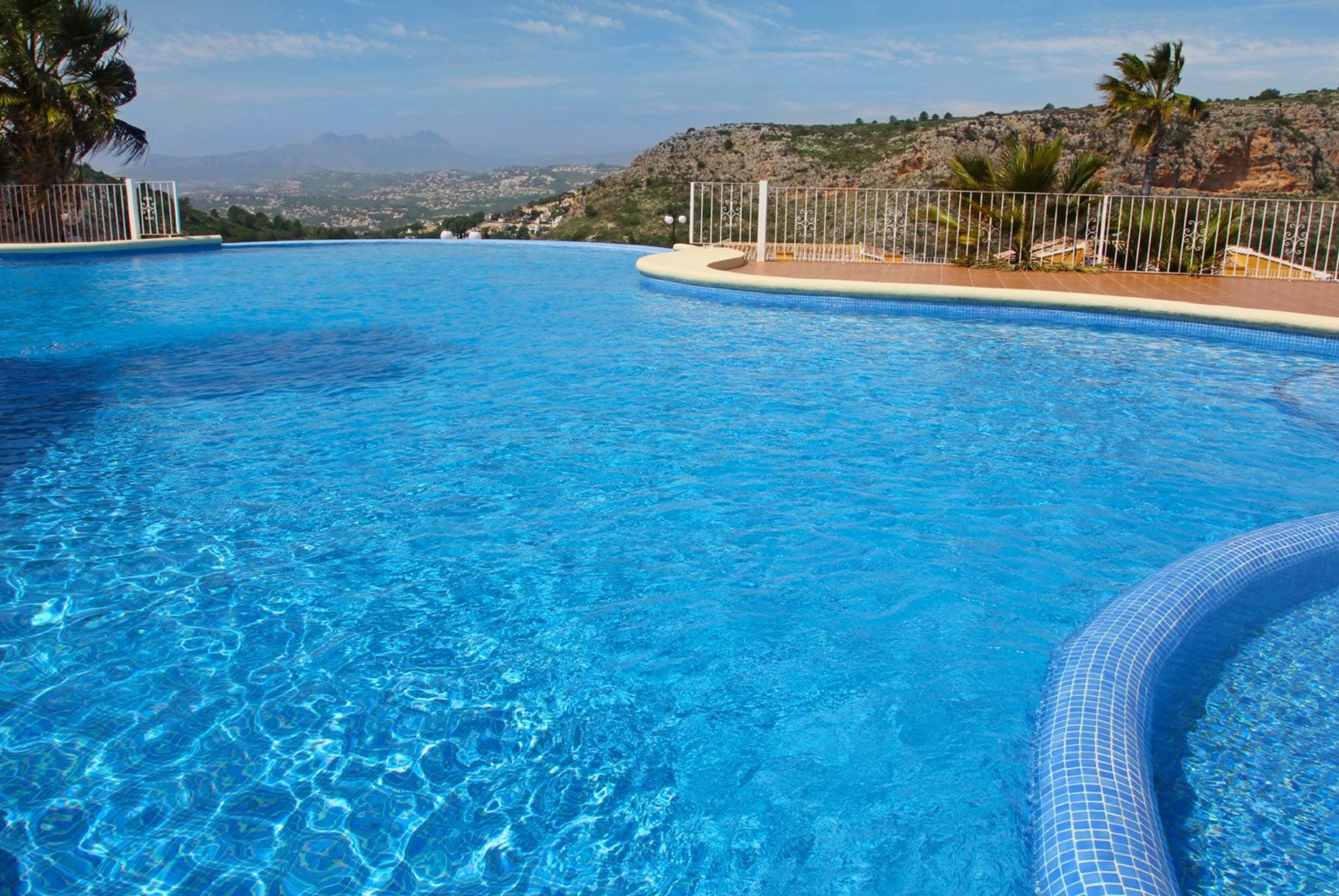 Pool area with sun loungers