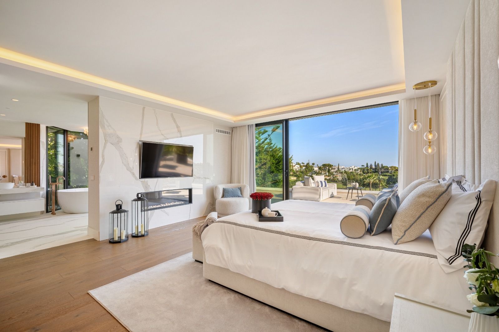 Kitchen with central island and fitted units in 6-bedroom new-build villa, Las Brisas, Marbella