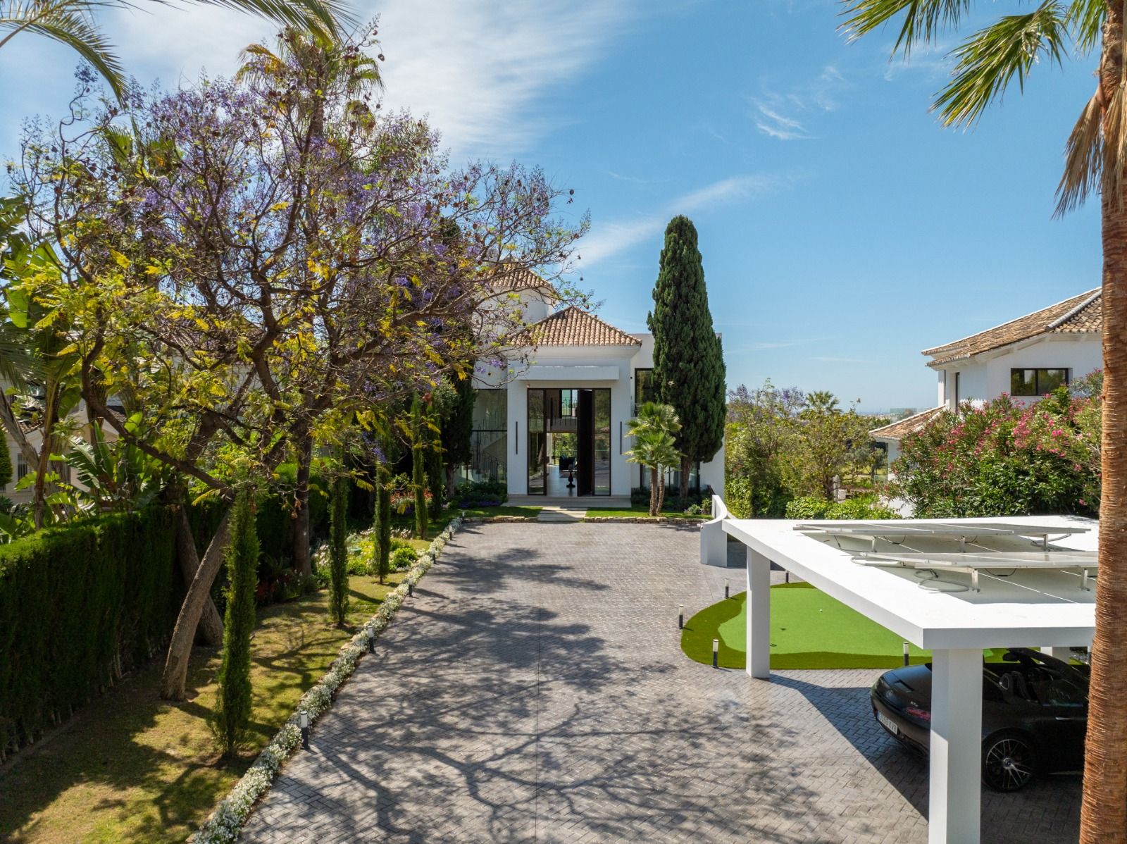 Covered outdoor kitchen and barbecue area in new-build villa, Las Brisas, Marbella