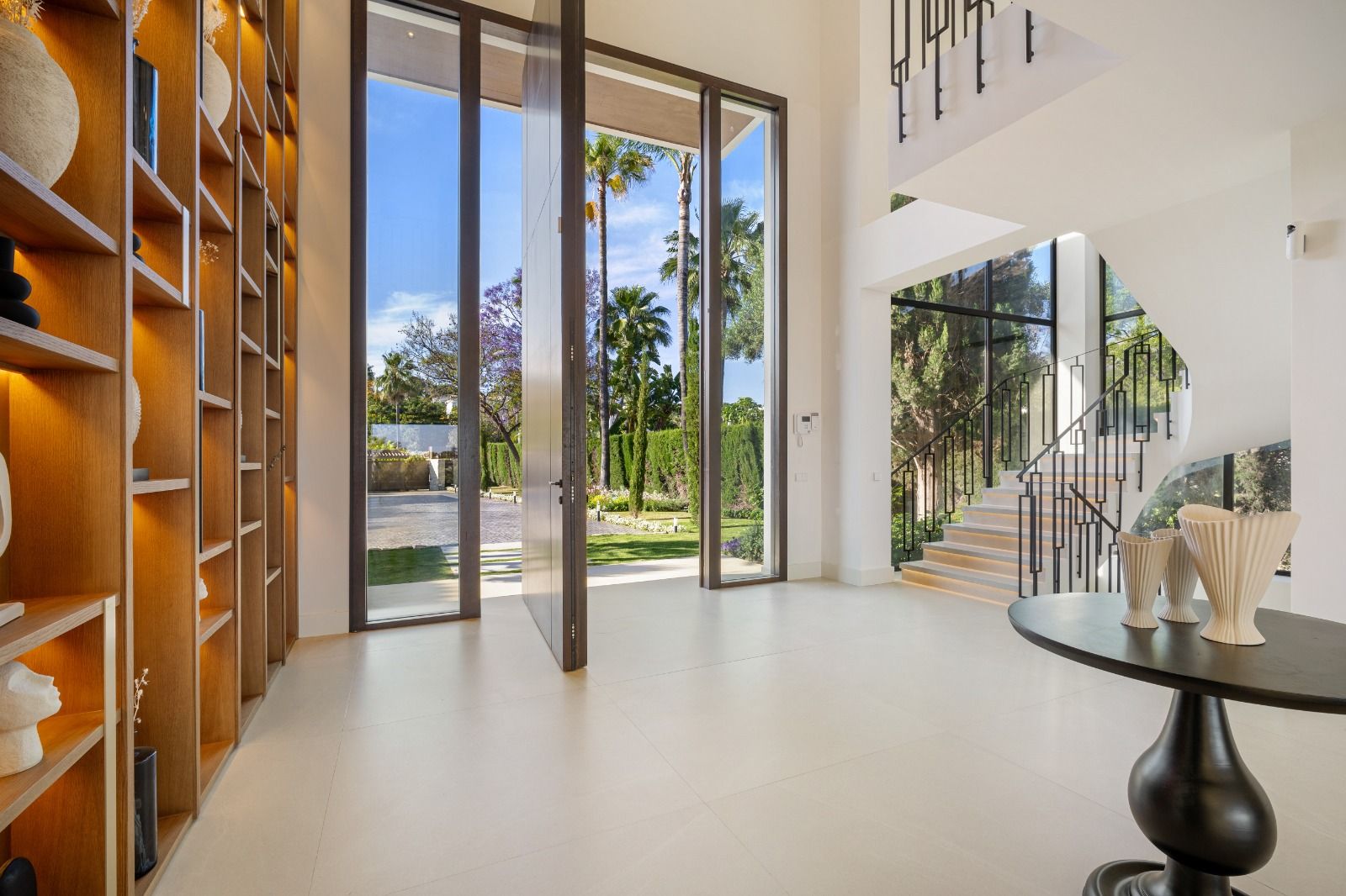 Ground-floor living room with glazed doors to terrace in new-build villa, Las Brisas, Marbella