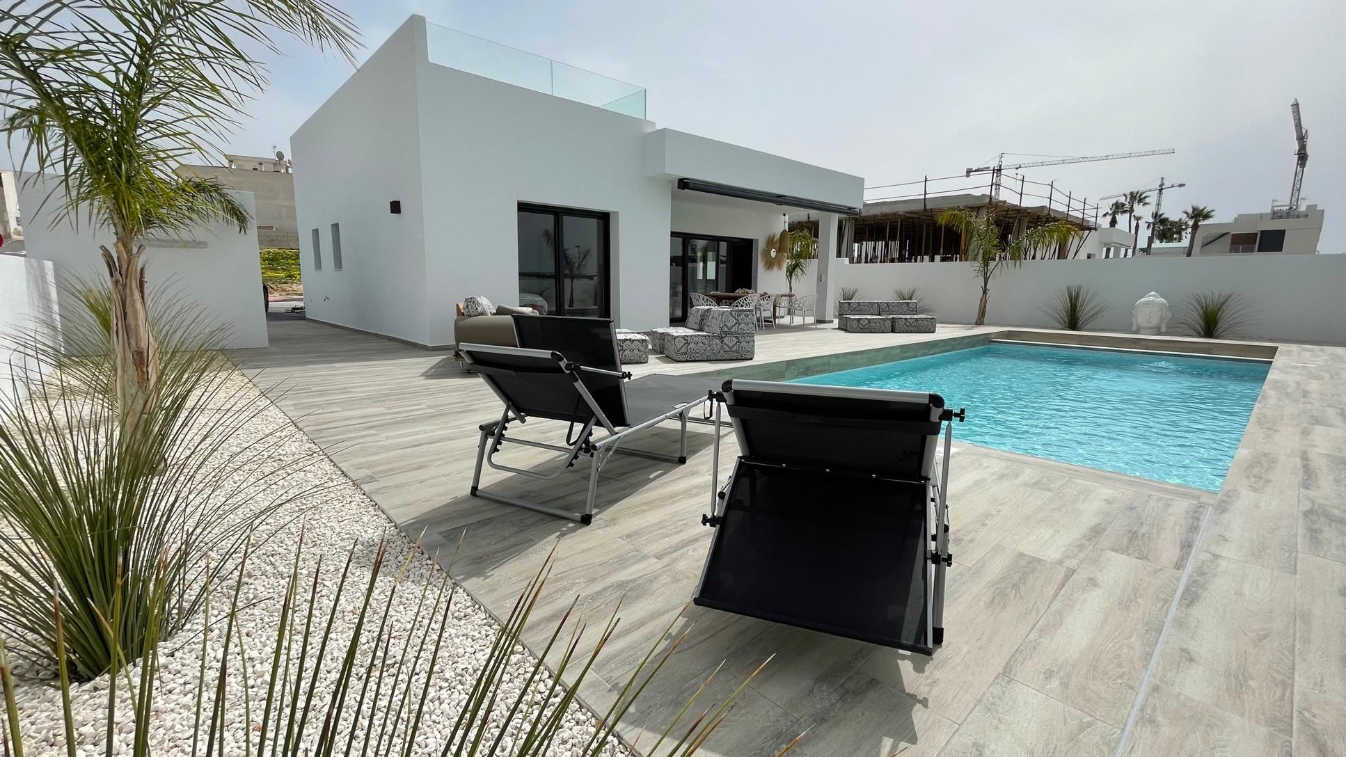 CGI exterior view of villa showing garden and facade in Rafal, Alicante