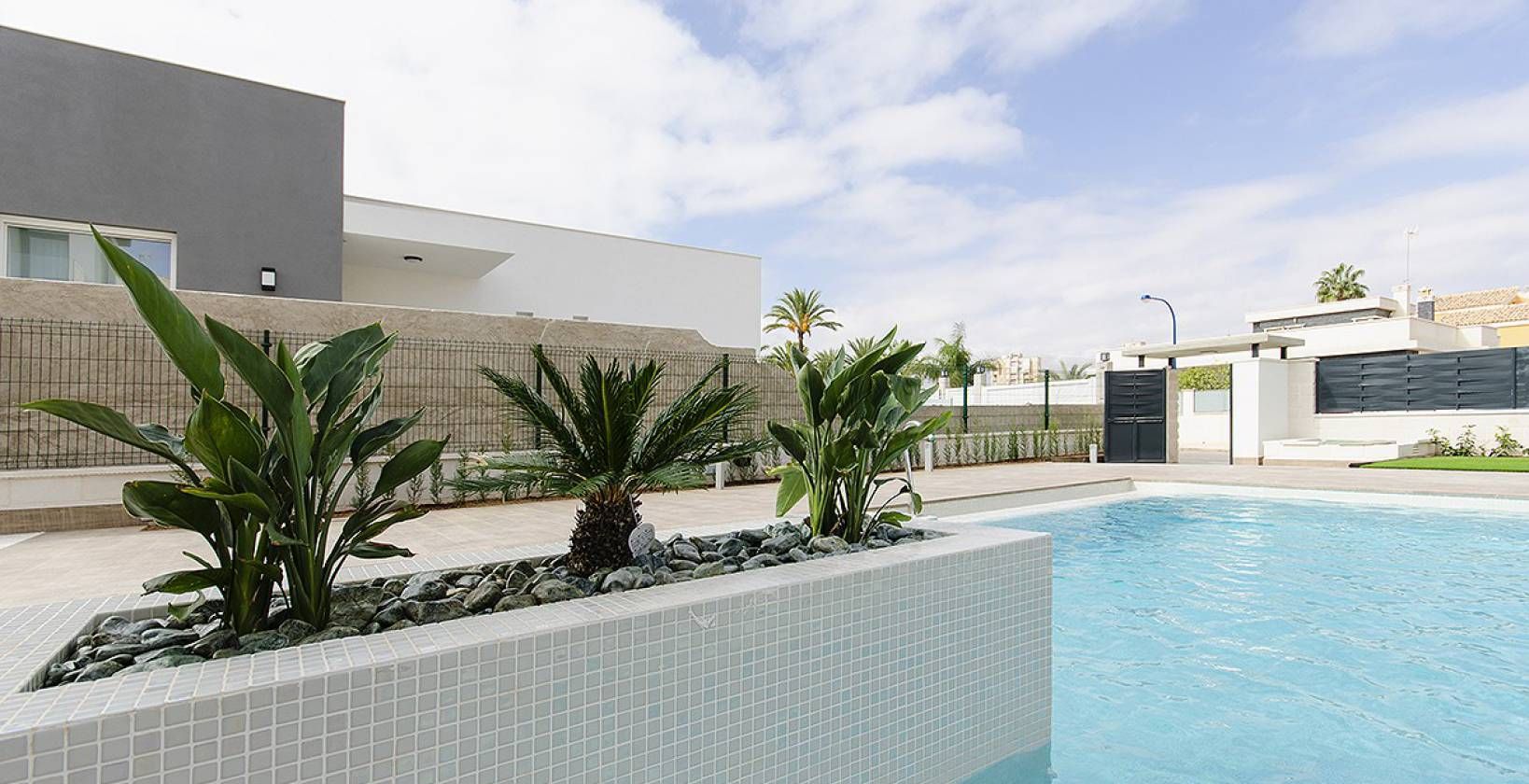 Exterior plot and approach to new-build villa, Campoamor, Orihuela Costa