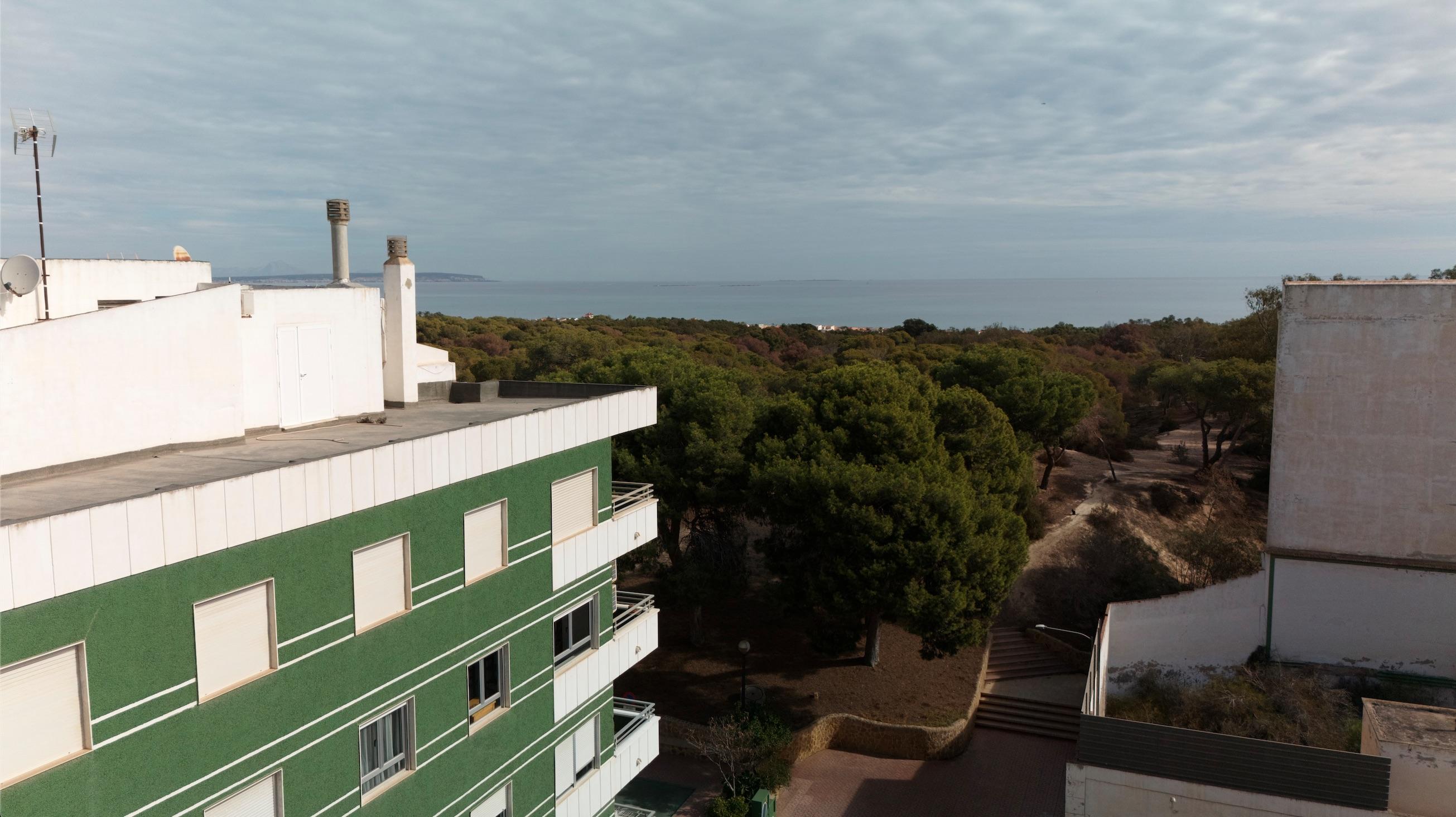 Communal outdoor seating beside rooftop pool, new-build development, Zona Pueblo, Guardamar Del Segura