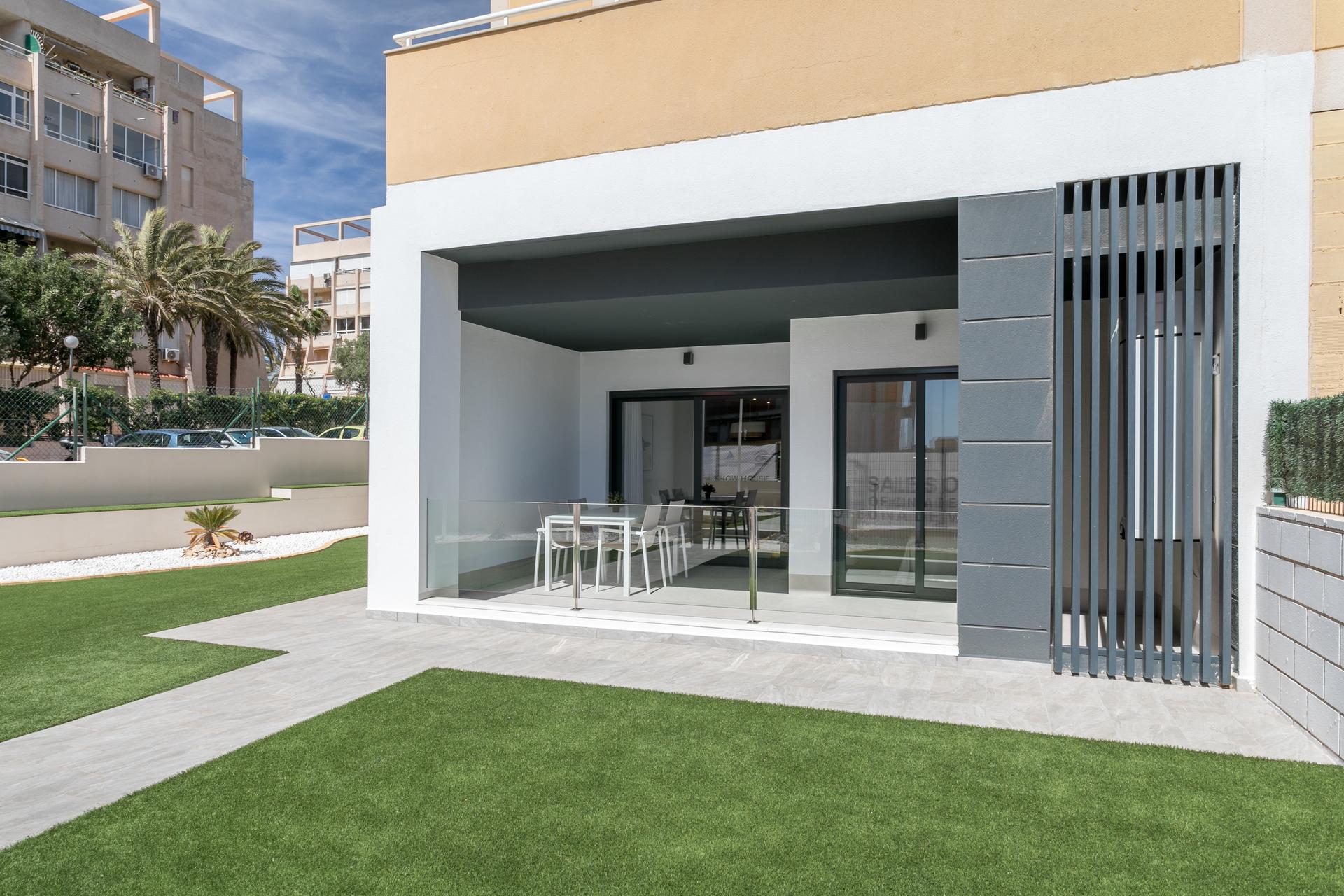 Living room with electric shutters in new-build penthouse, Torreblanca