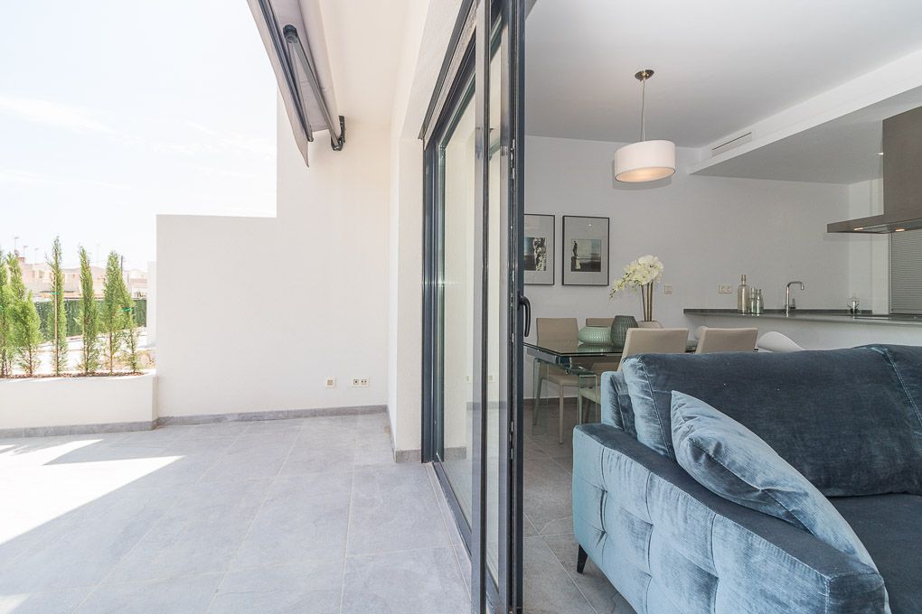 Ceramic tile flooring detail in living room of new-build bungalow, Los Balcones