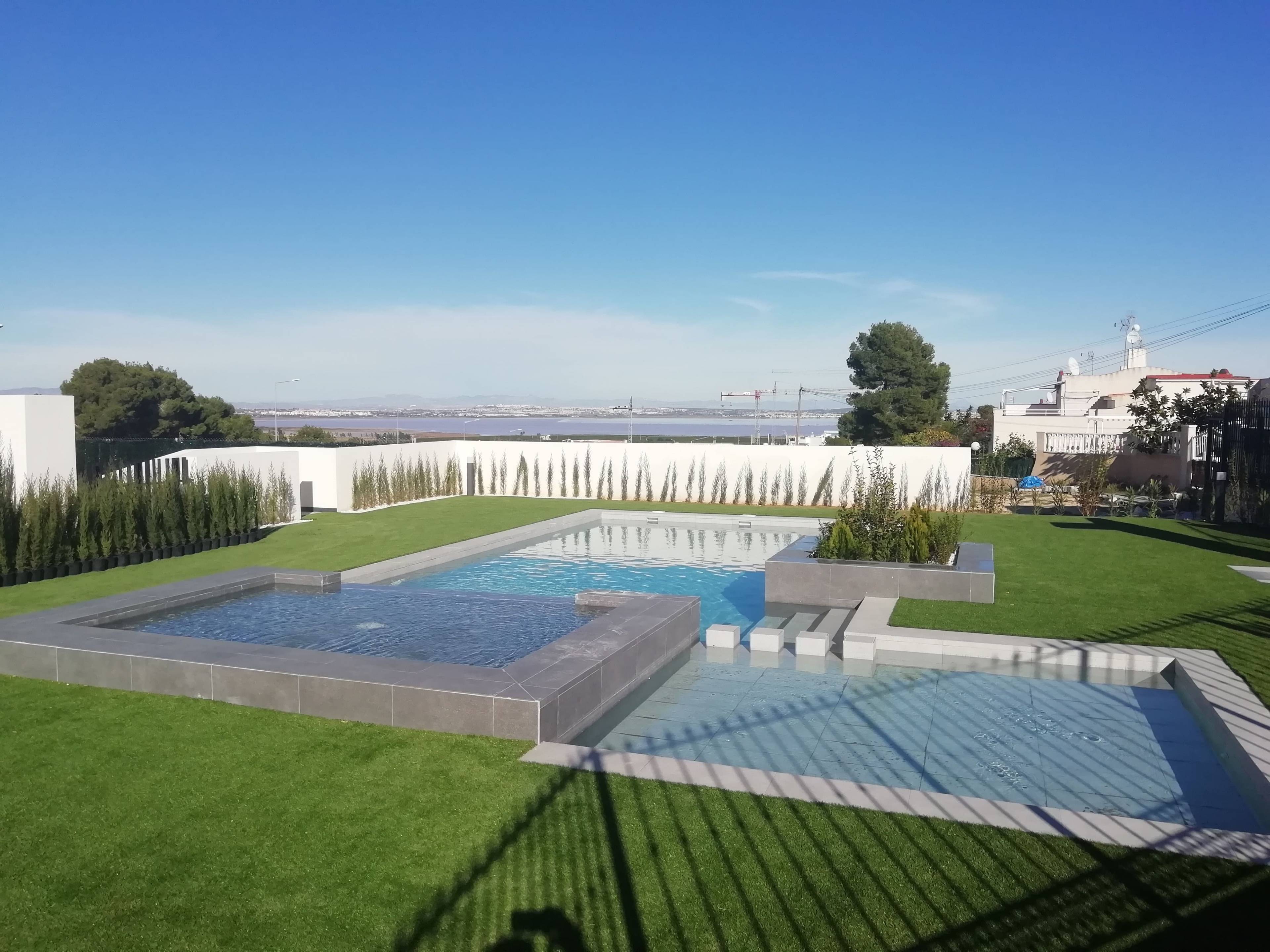 Pool surround with sunlounger area in new-build complex, Los Balcones, Torrevieja