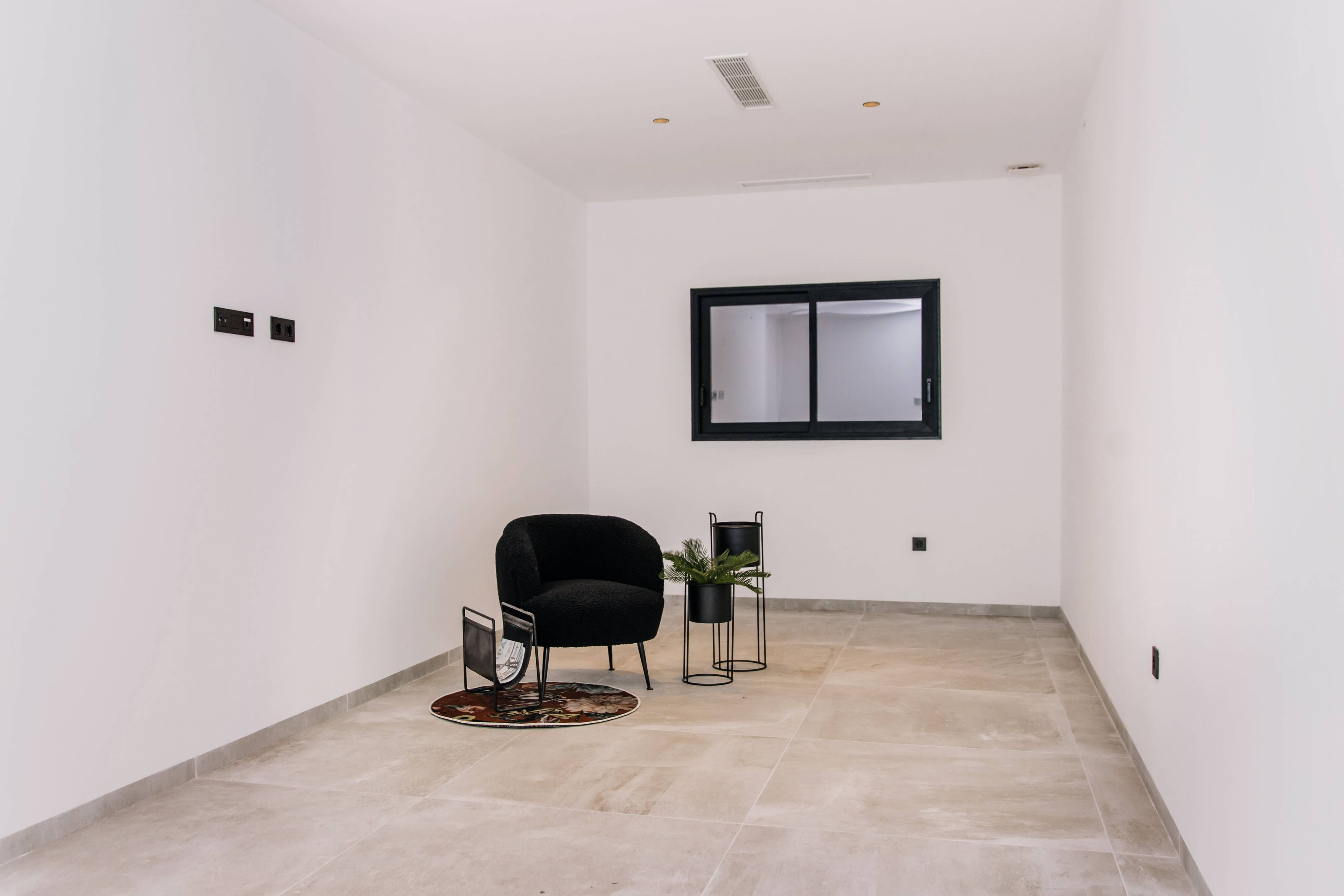 Render of living room from alternate angle in 4-bedroom villa, Campo de Golf La Marquesa
