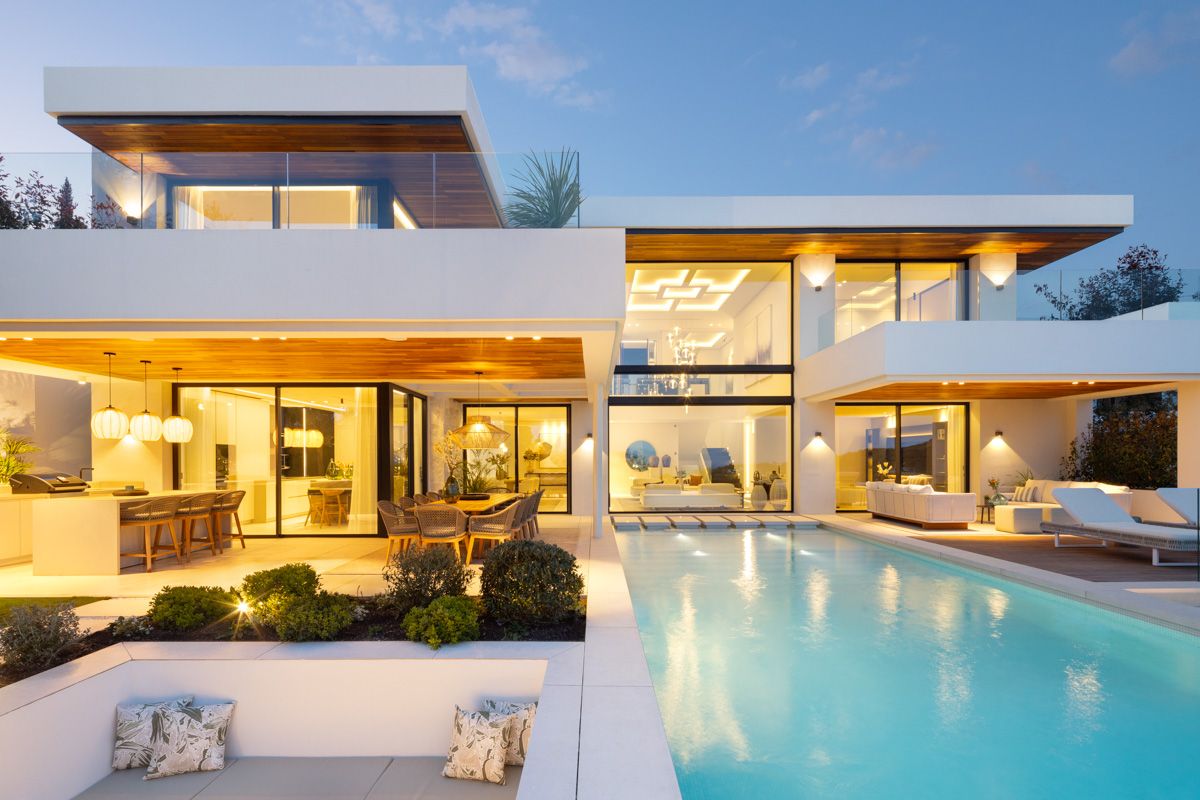 Outdoor dining area on terrace of new-build villa, La Quinta, Benahavis