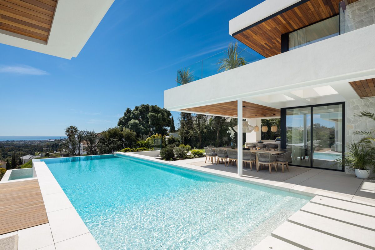 Exterior evening view of 6-bedroom new-build villa, La Quinta, Benahavis