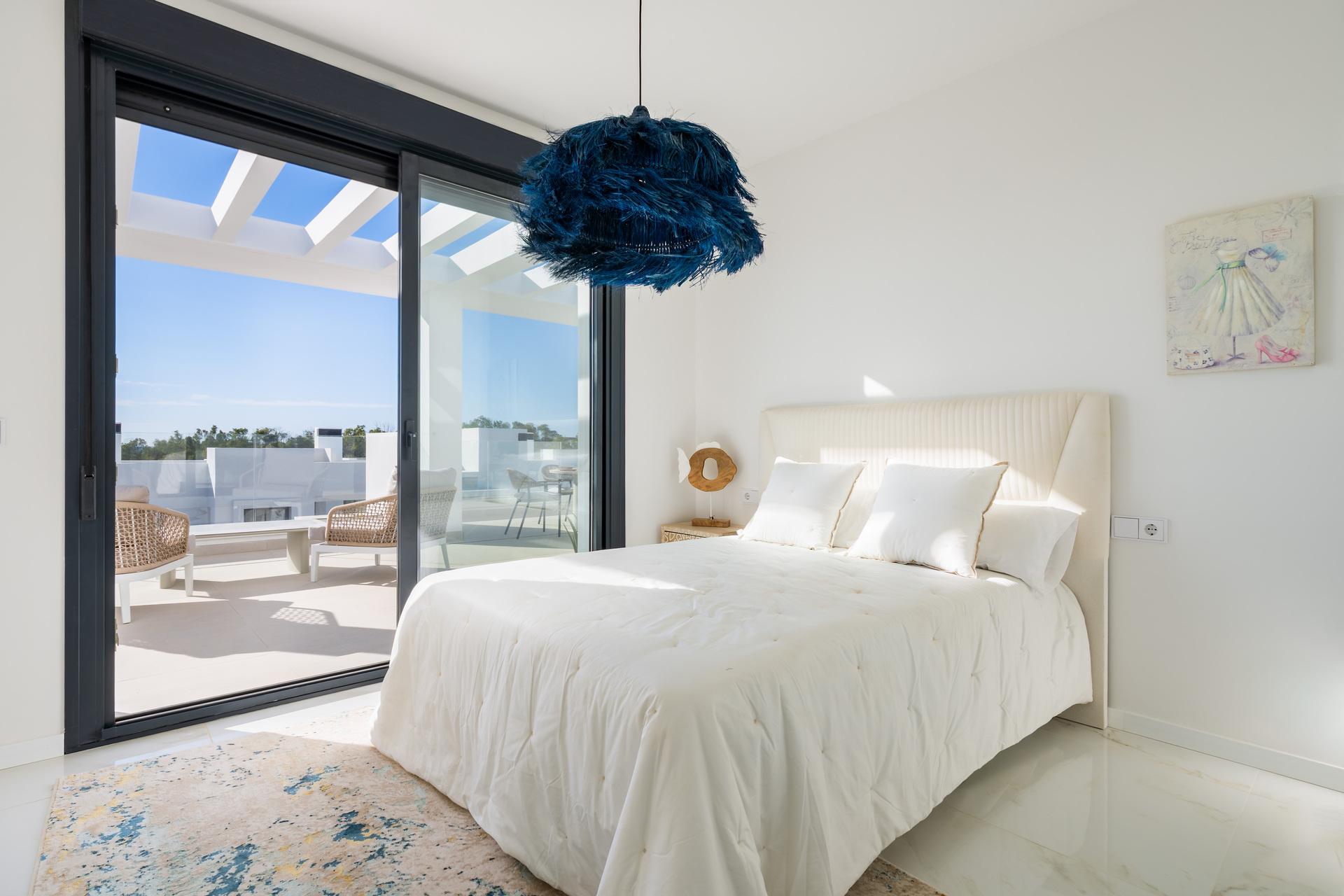 View from solarium over development rooftops, Arroyo Vaquero, Estepona