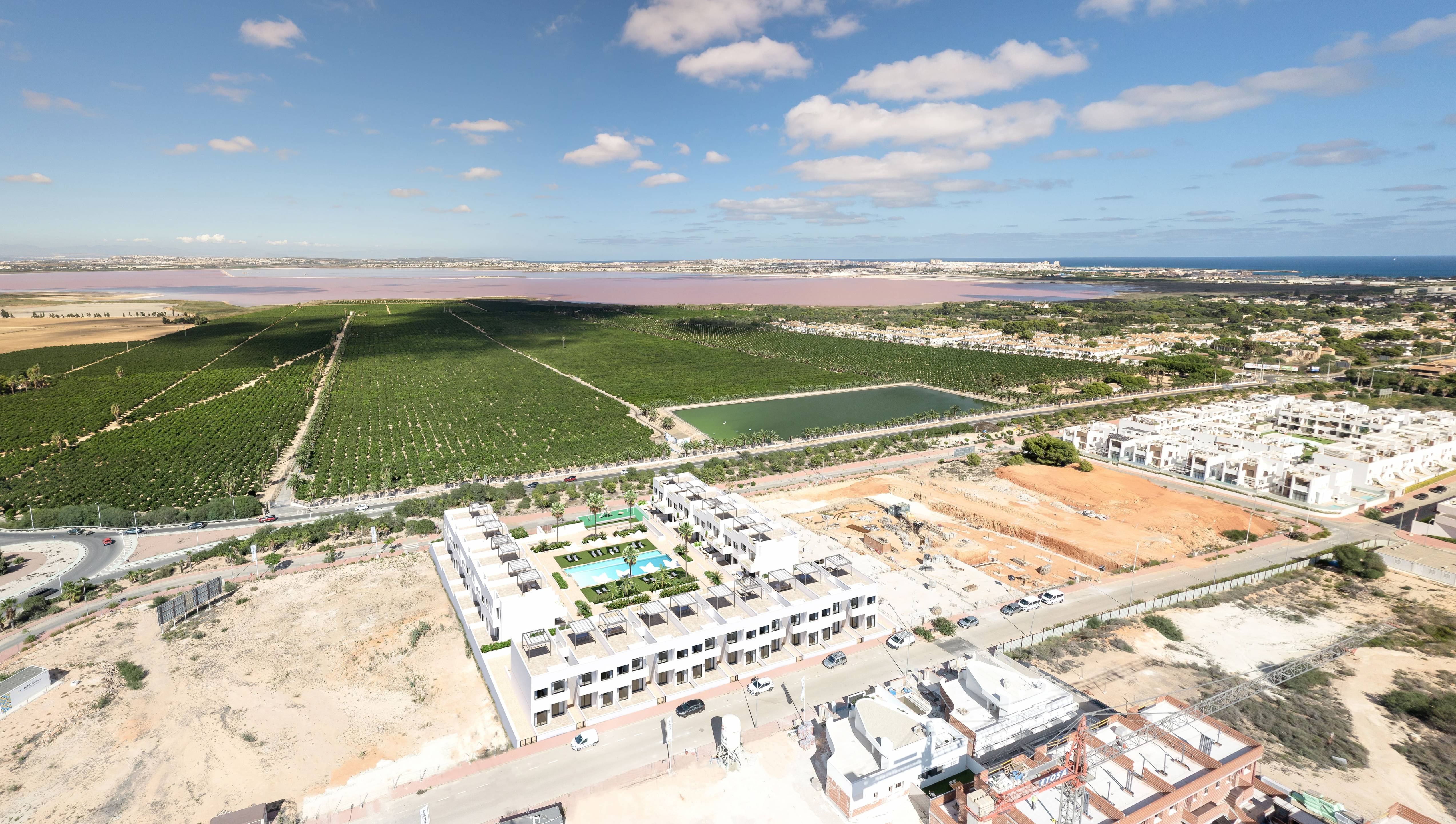 Communal pool overlooking the Salinas de Torrevieja pink lagoon