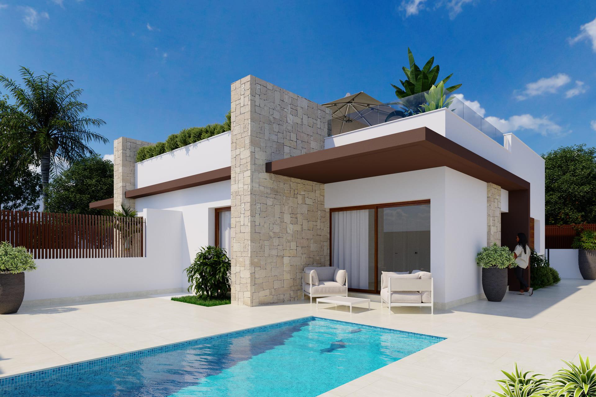 Row of new-build townhouse units in small development exterior, Desamparados, Orihuela