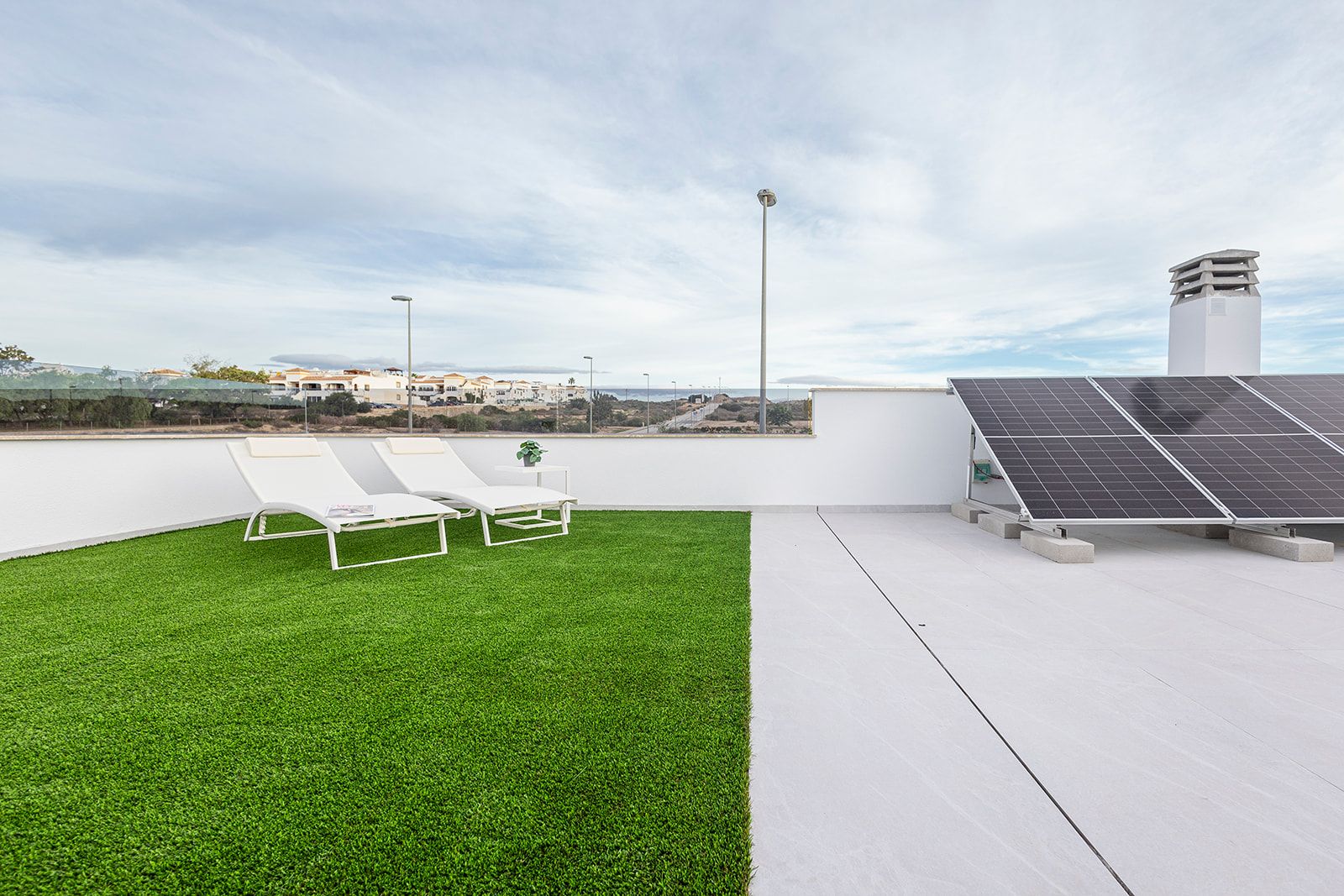 Pool and garden viewed from ground level in new-build townhouse, Desamparados, Orihuela