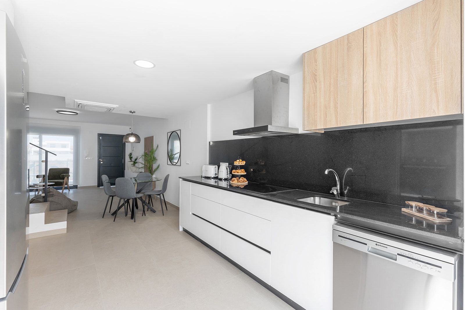 Kitchen cabinetry and integrated appliances in new-build townhouse, Rafal