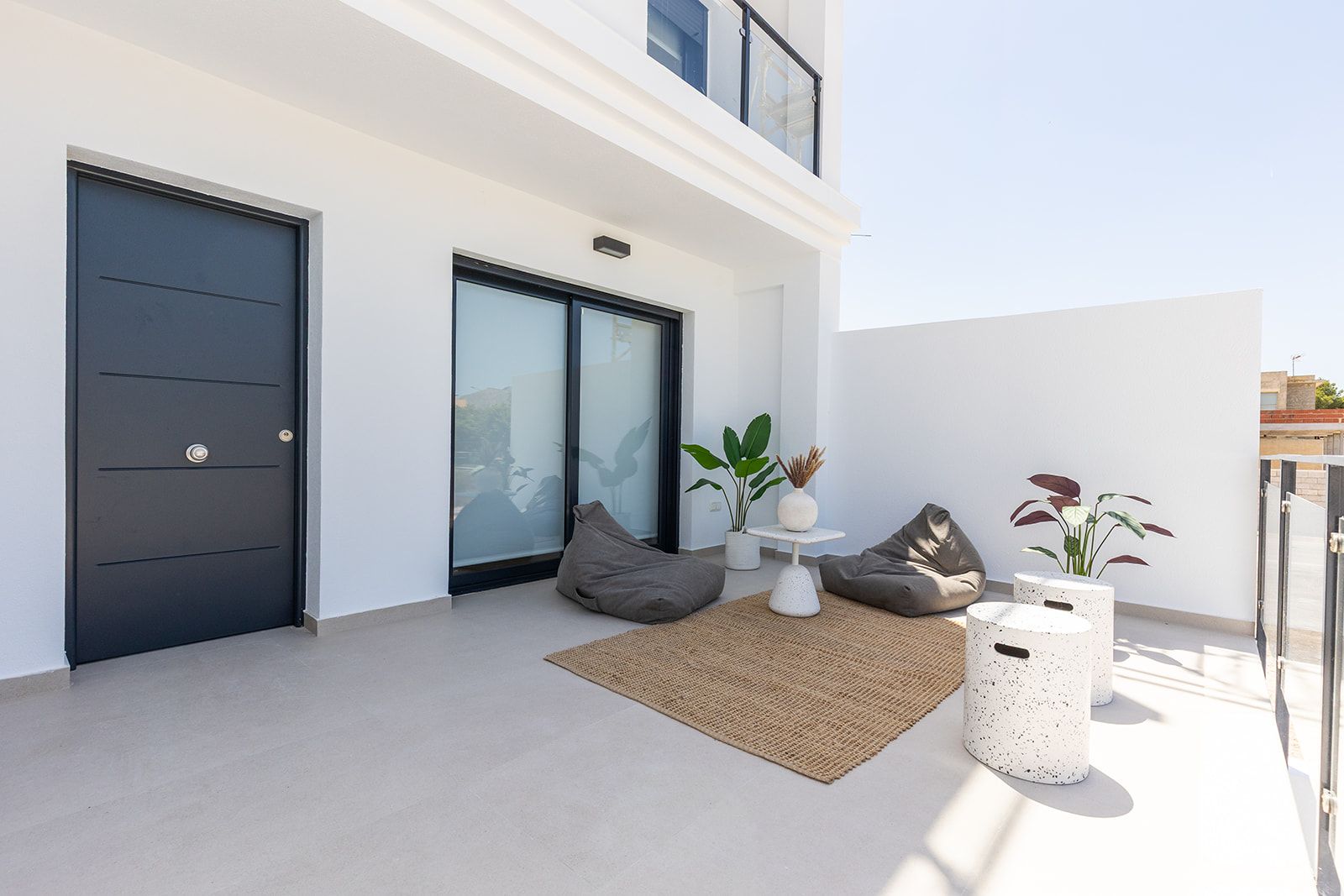 Communal exterior area of new-build townhouse development, Rafal