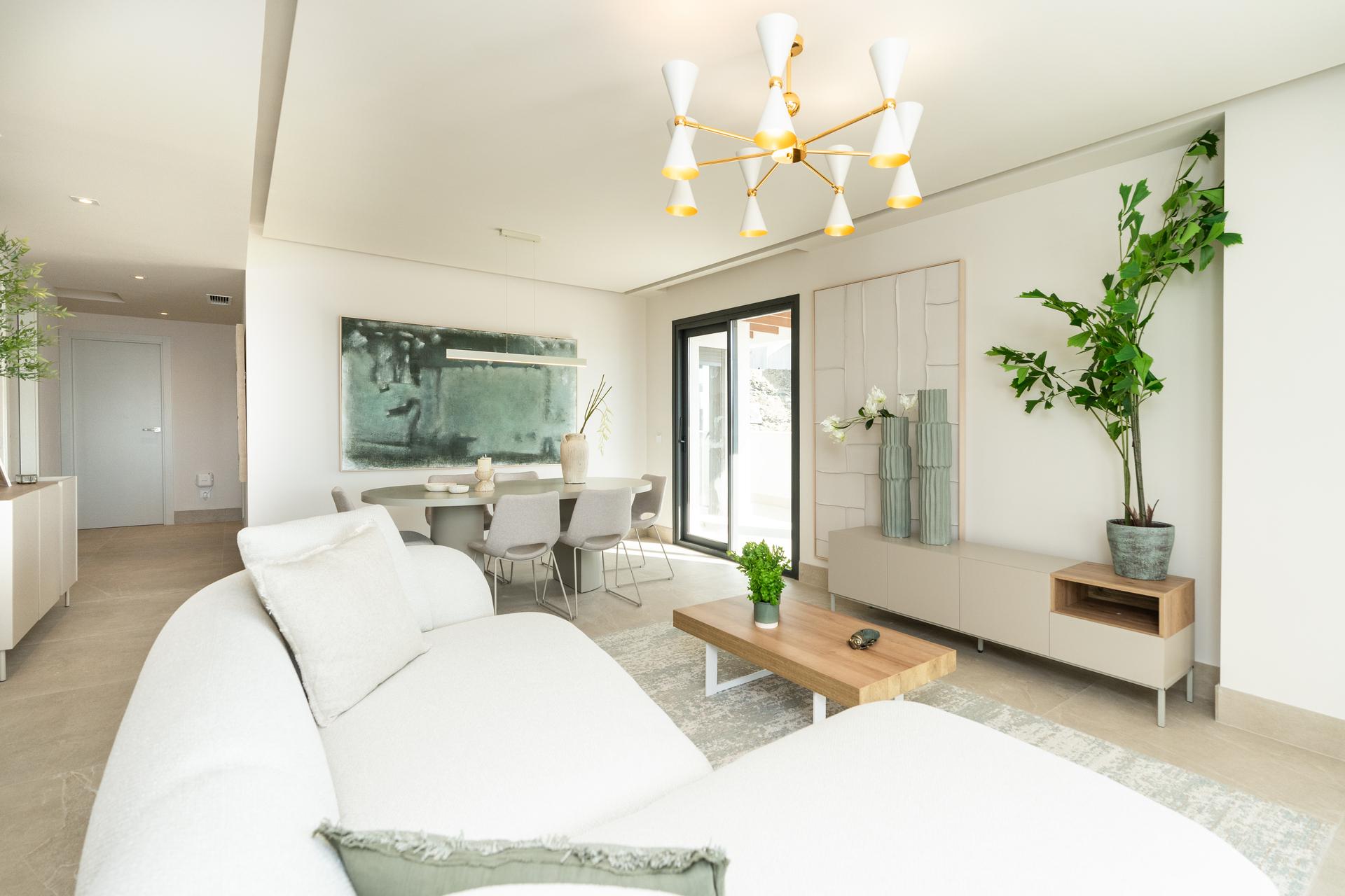 Dining area within open-plan living space, new-build apartment, El Paraíso, Benahavis