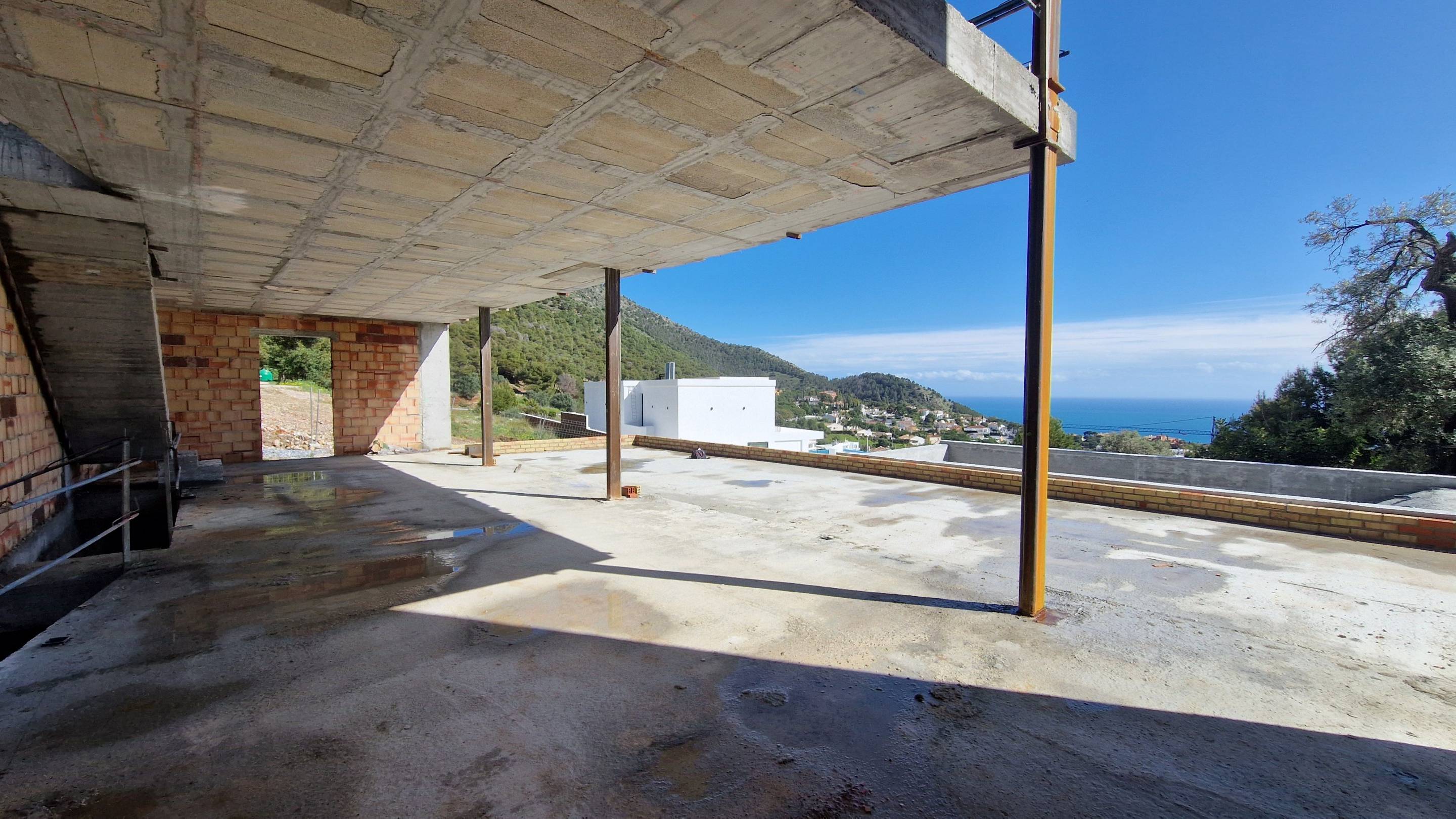 Street-level view of entrance access for new-build 5-bedroom villa in Mijas Pueblo, Mijas