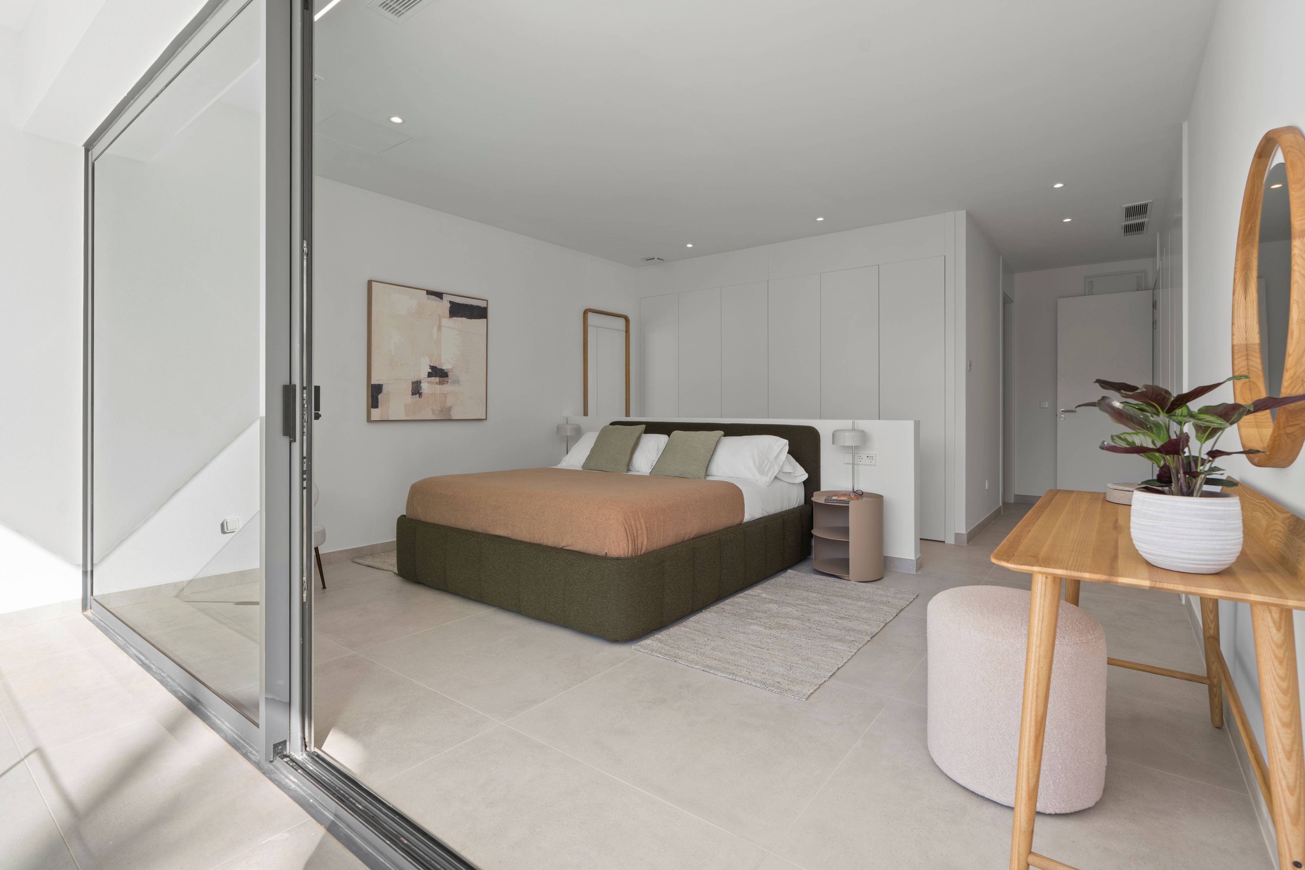 Living room with floor-to-ceiling glazing in Rincón de Loix villa