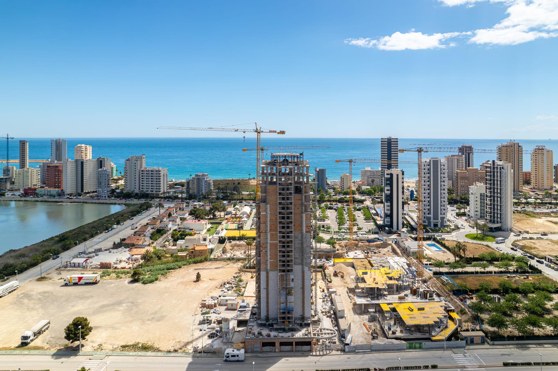 Coastal and mountain view from upper-floor apartment in new-build complex, Calpe Town