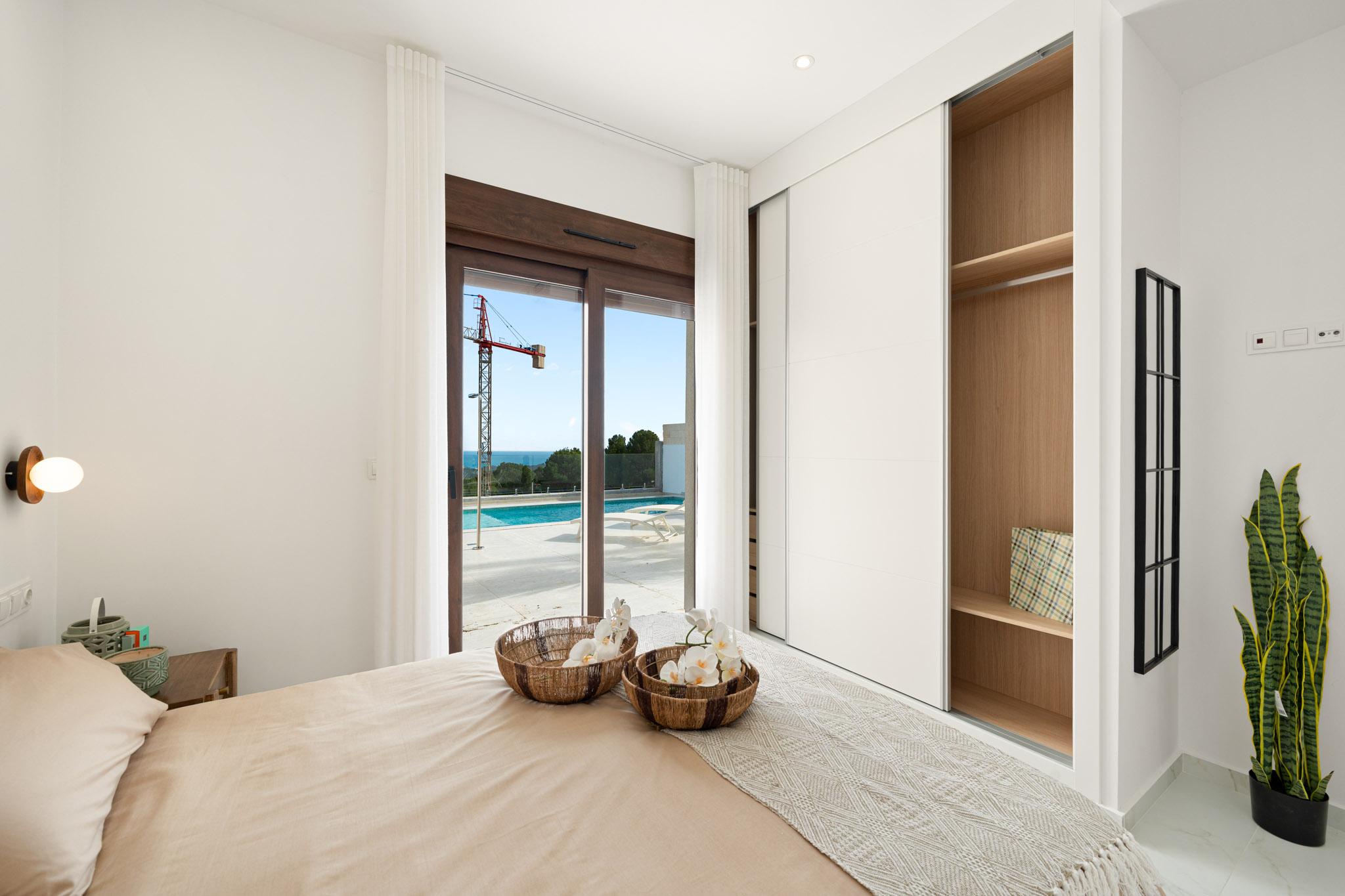 Living room interior with fitted lighting, new-build villa, Pla de Cantal
