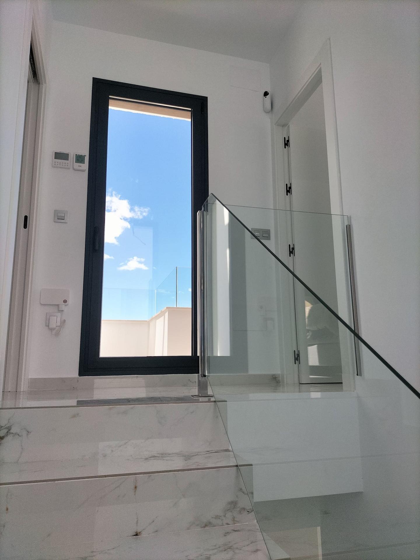 Communal pool viewed from deck level, new-build development, Pinar de Campoverde