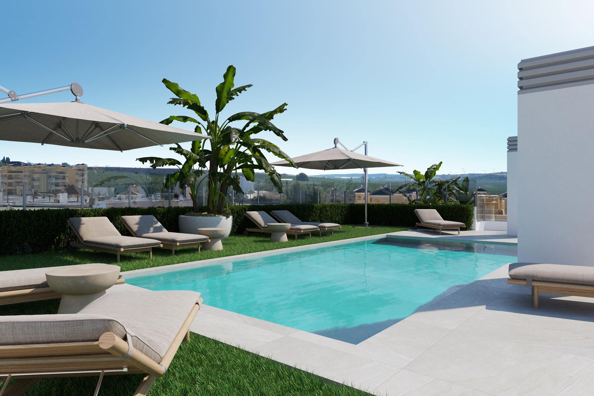 Communal pool area and landscaped gardens