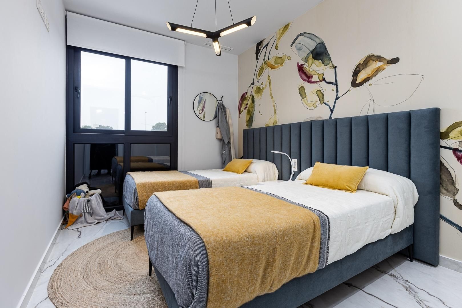 Master bedroom showing window and fitted wardrobes, Lo Marabú villa