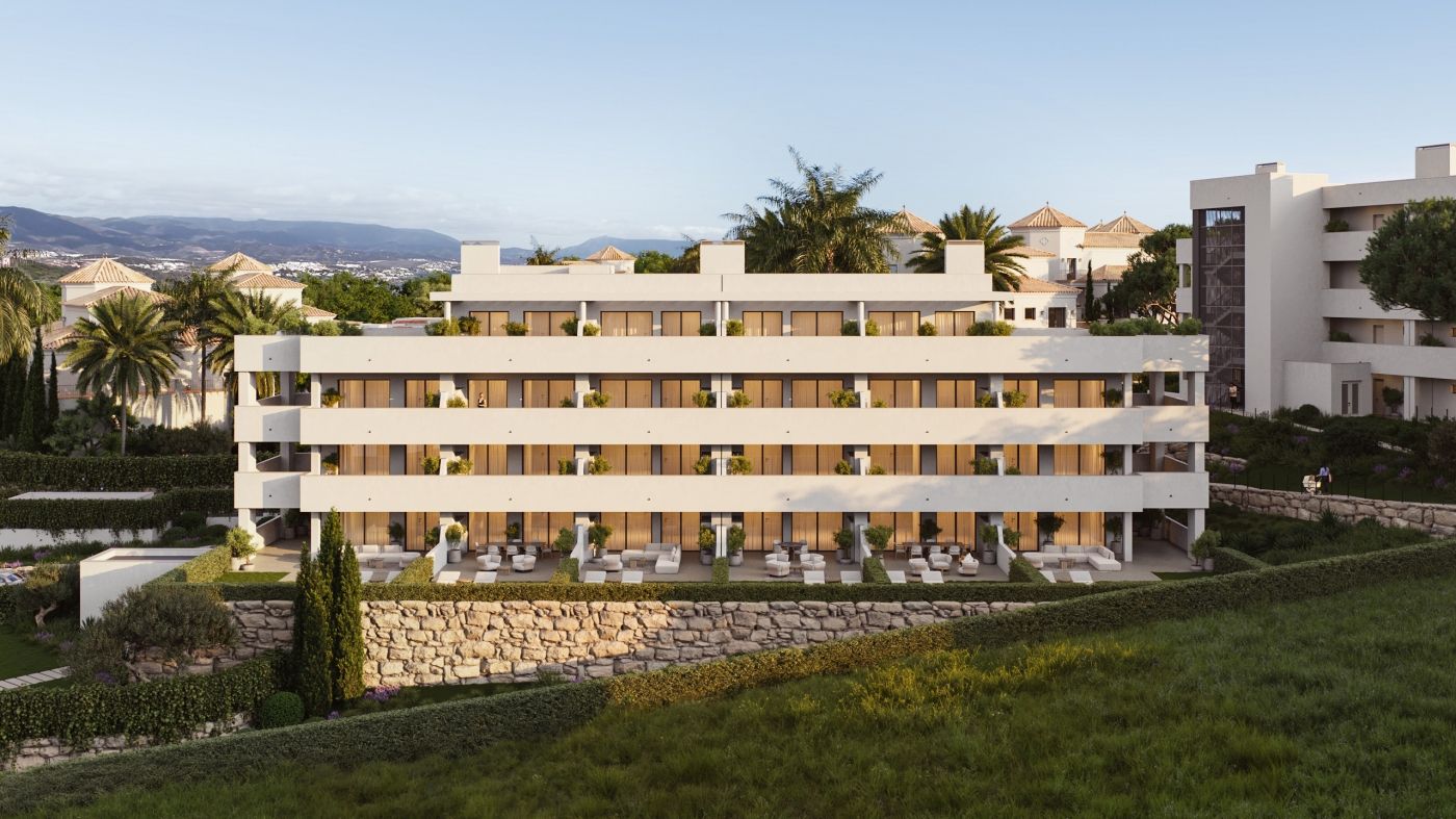 Communal pool area with sun terrace, El Castillo development, Manilva