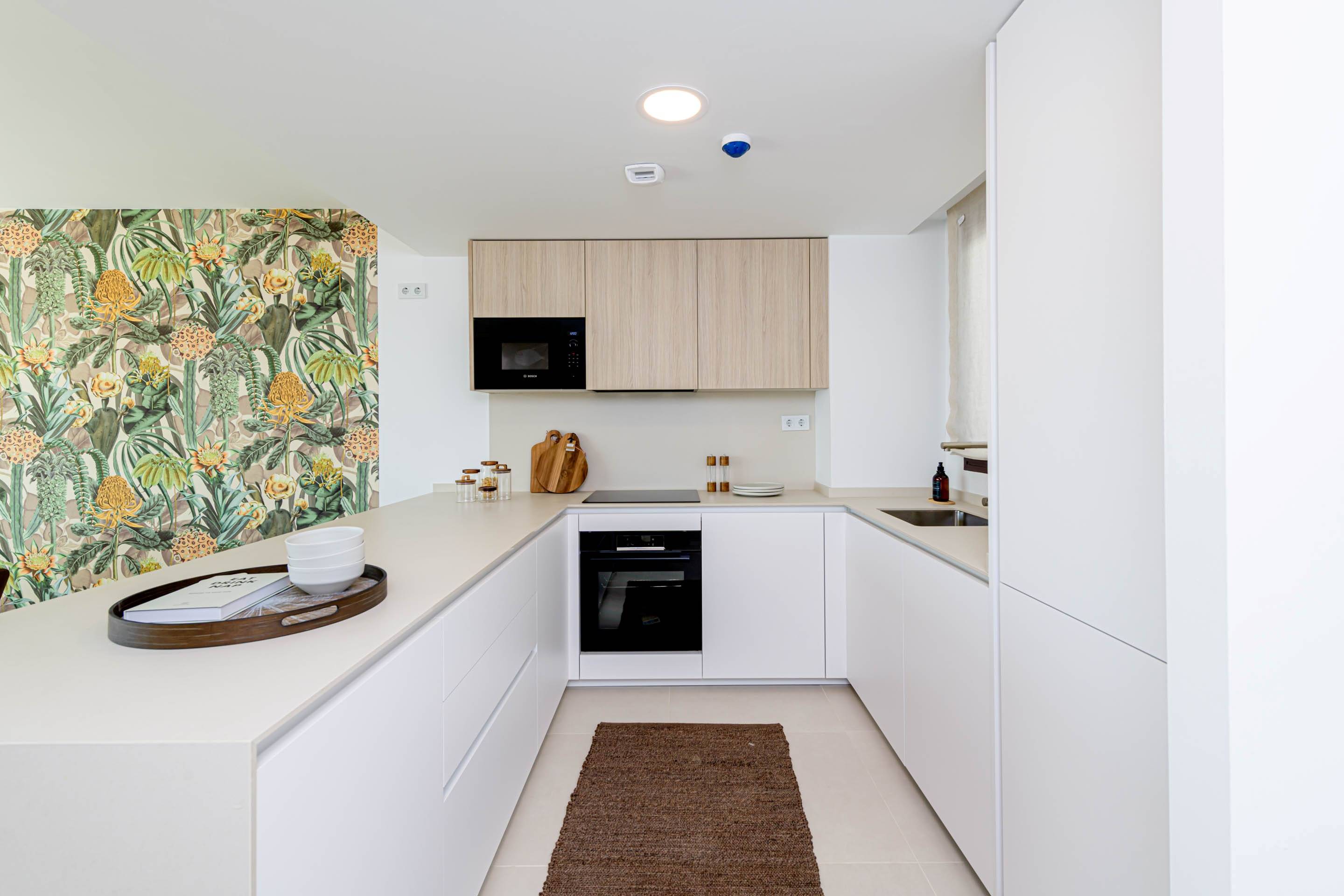 Open-plan living and dining from kitchen end, 193 m2 penthouse, El Higuerón