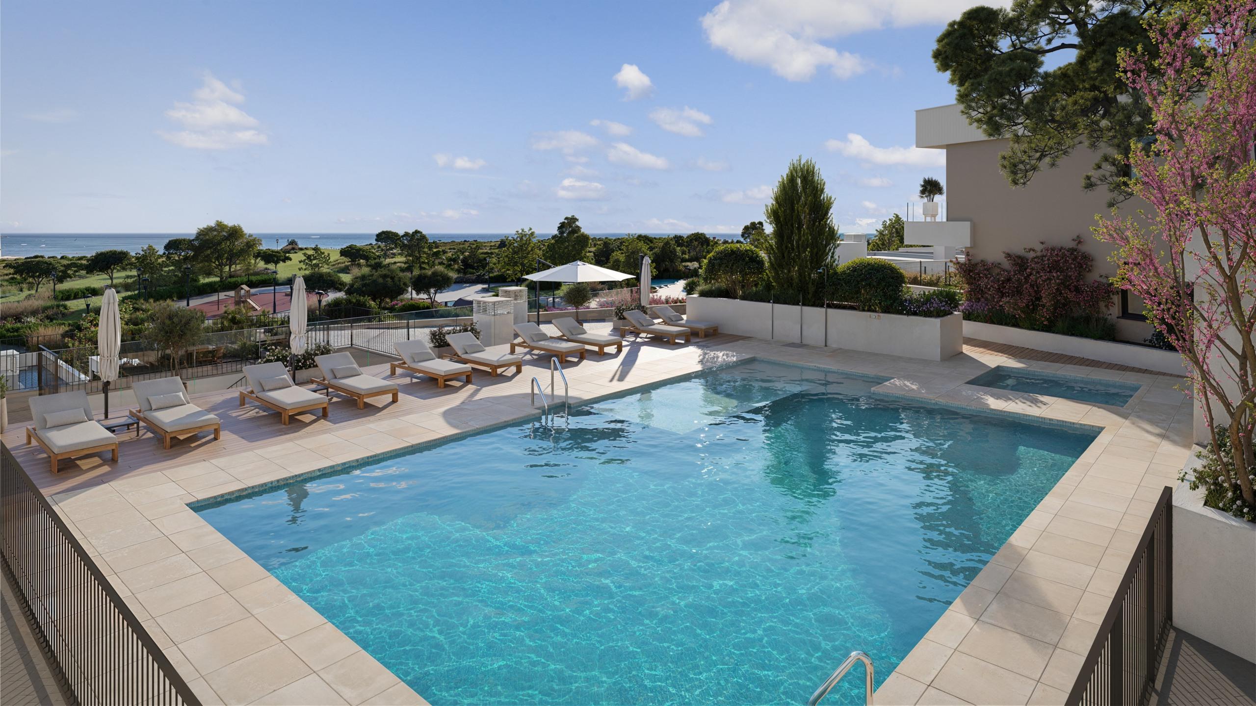 Communal pool area in gated new-build development, El Higuerón
