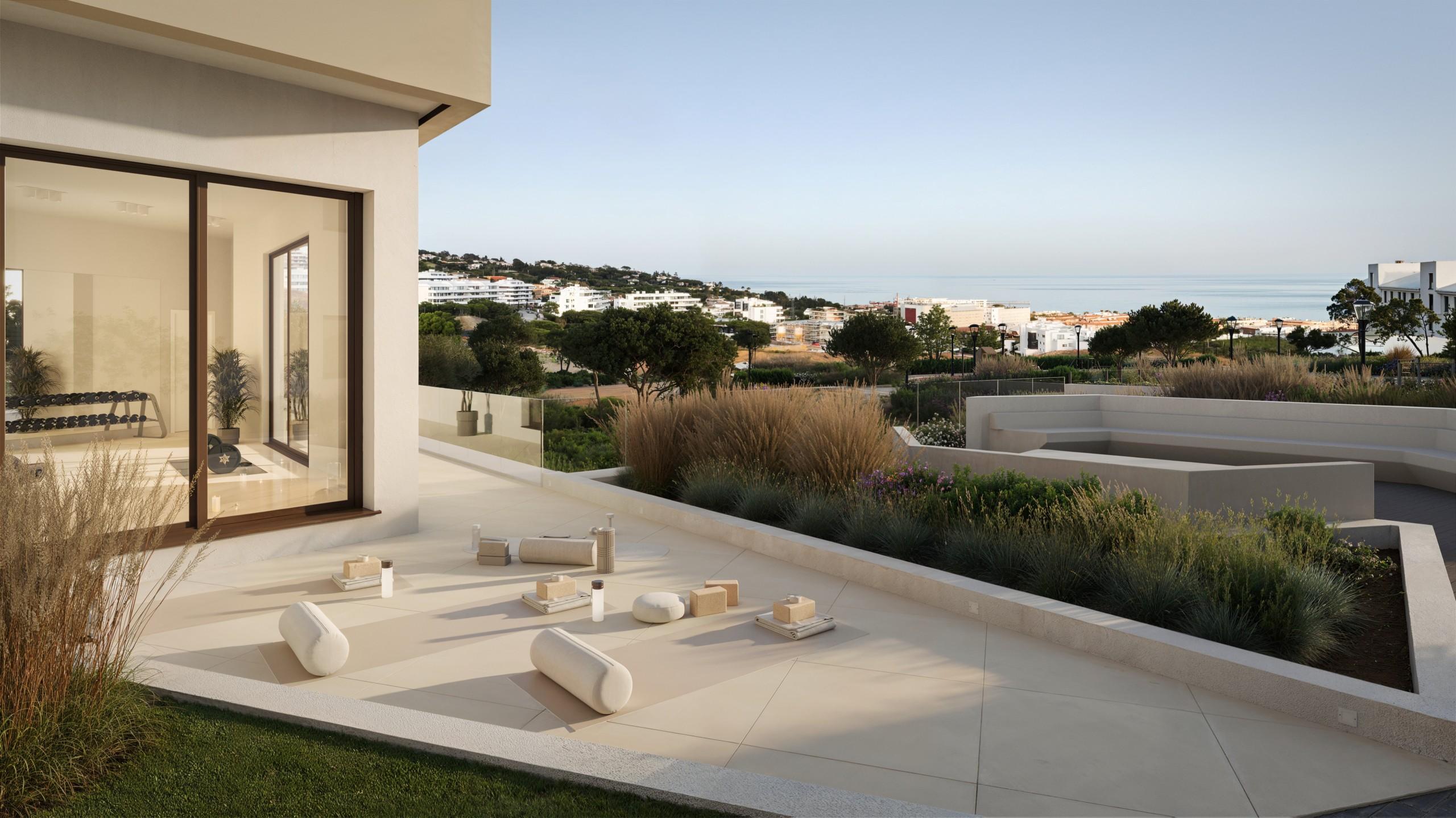 Bedroom with coastal view from window in new-build townhouse, El Higuerón