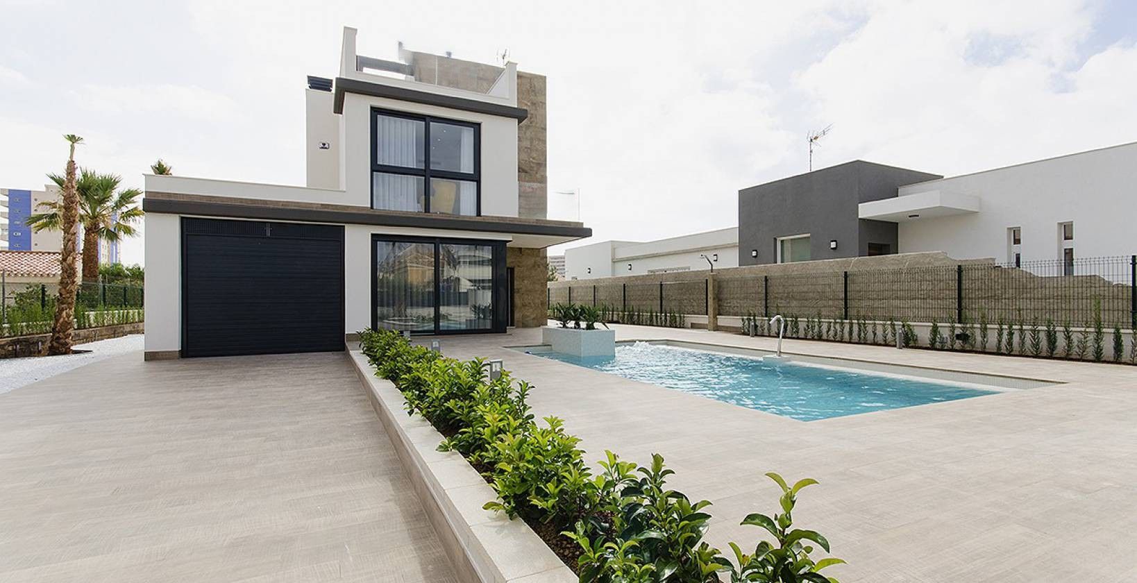 Covered outdoor terrace with seating area in new-build villa, Campoamor