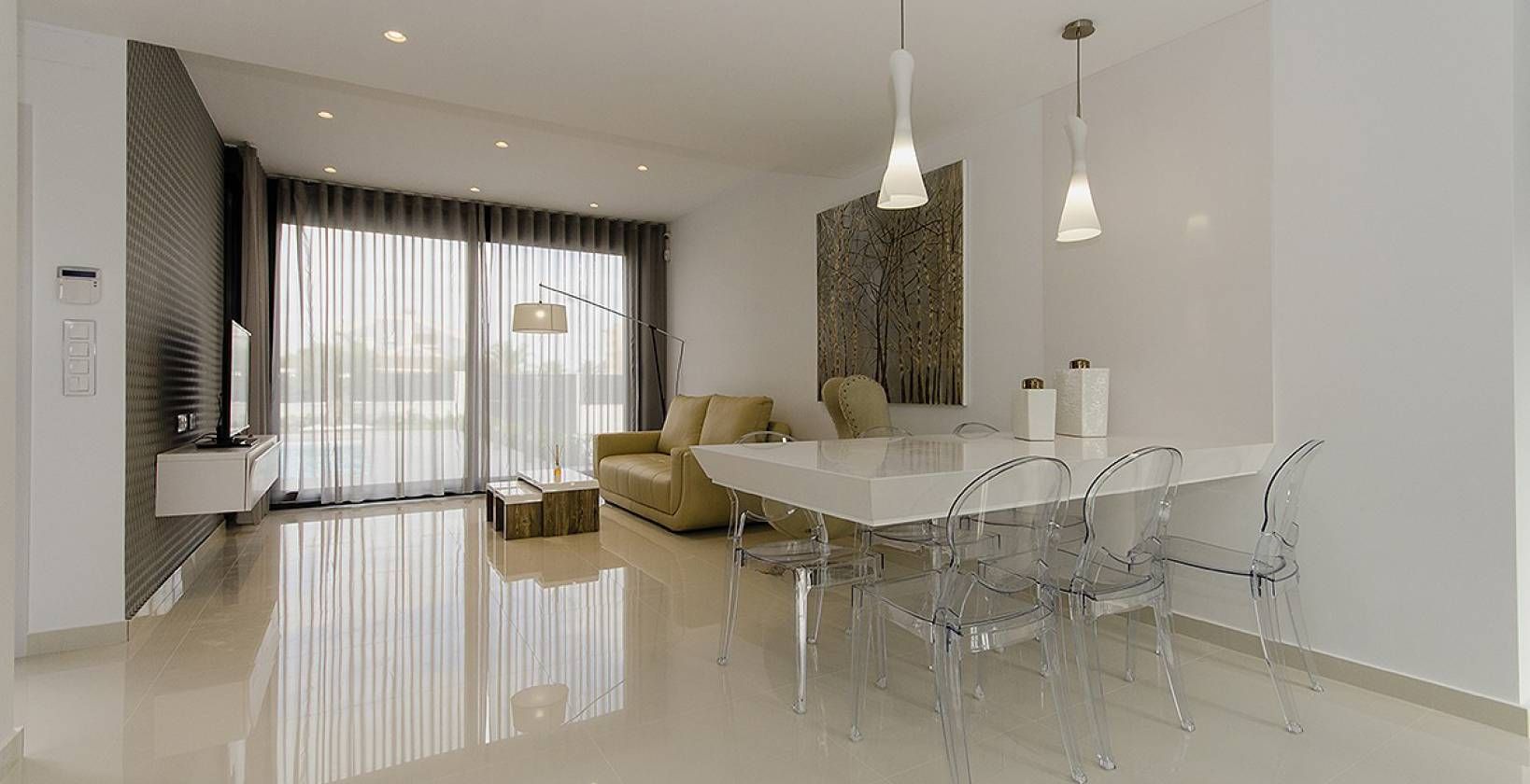 Living area with tiled floor finish in new-build villa, Campoamor