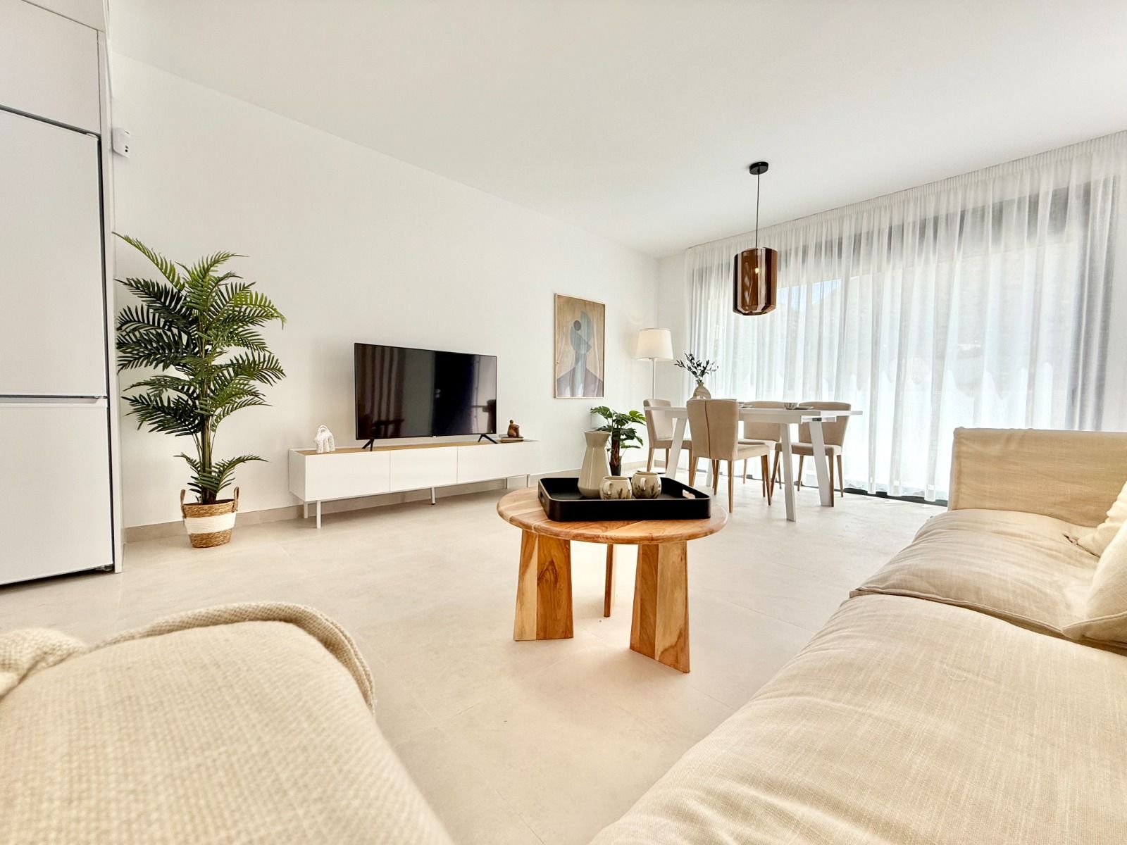Dining area in open-plan living space, bungalow, Cox