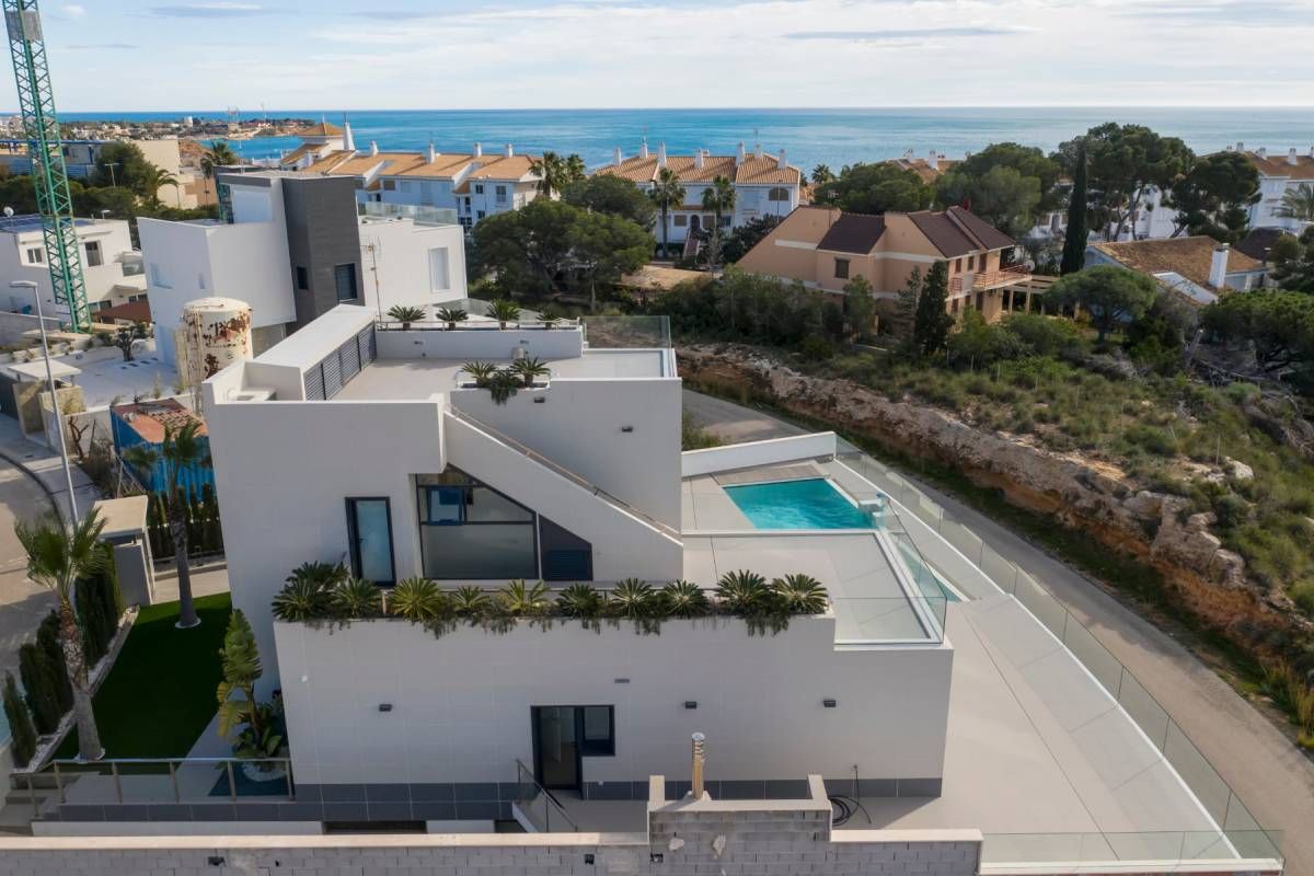 Outdoor terrace adjacent to living area in new-build villa, Campoamor