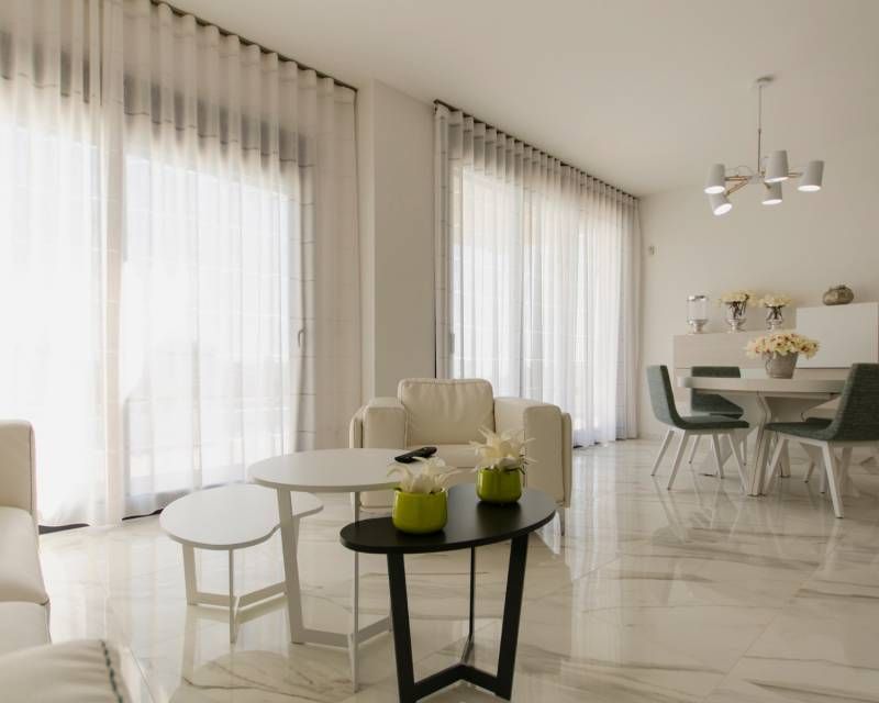 Side elevation of new-build villa exterior in Campoamor, Orihuela Costa