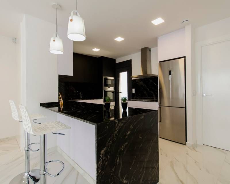 Open-plan living and dining area in 4-bedroom new-build villa, Campoamor