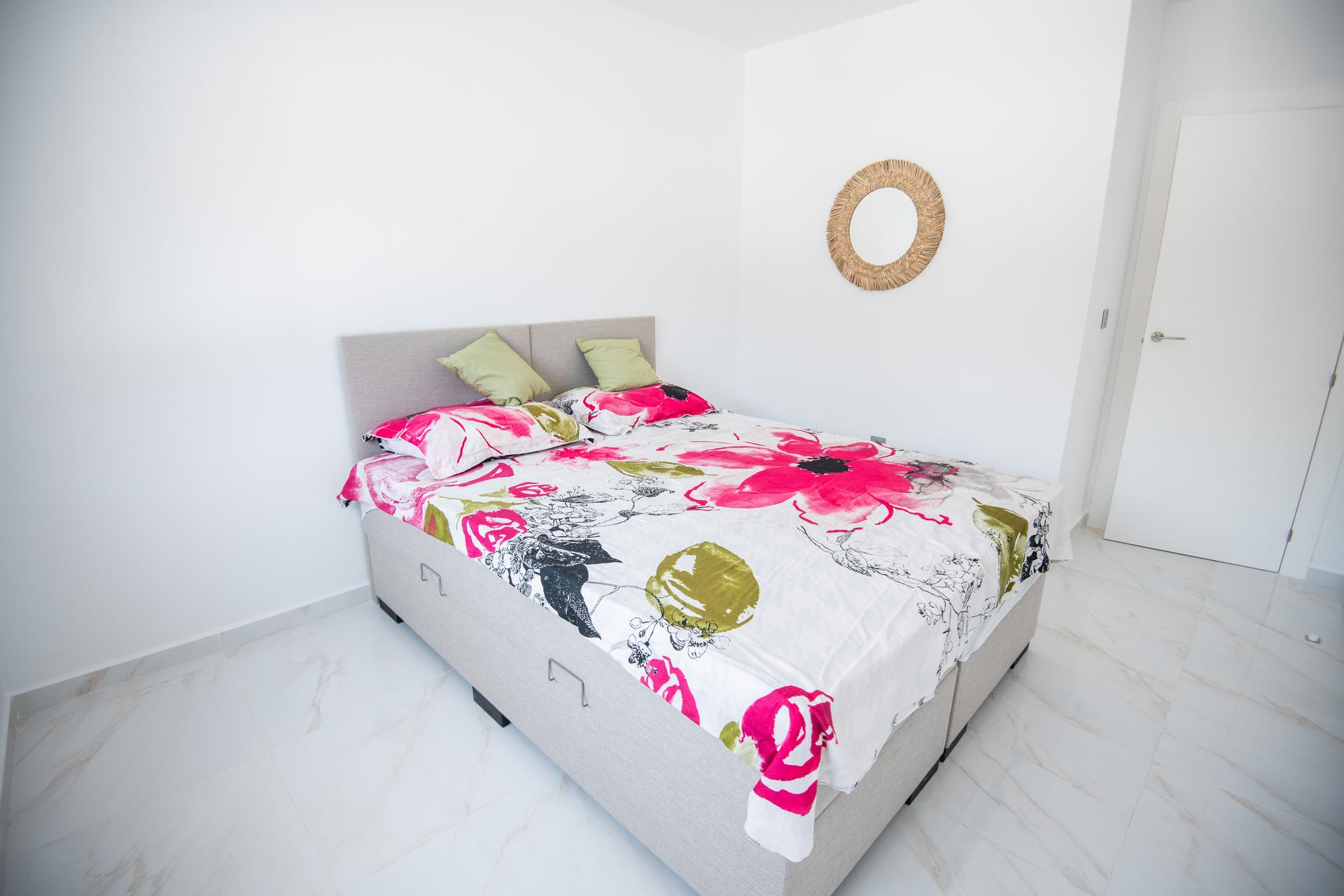 Exterior rendered wall finish at ground level, 2-bedroom villa, Pinar de Campoverde