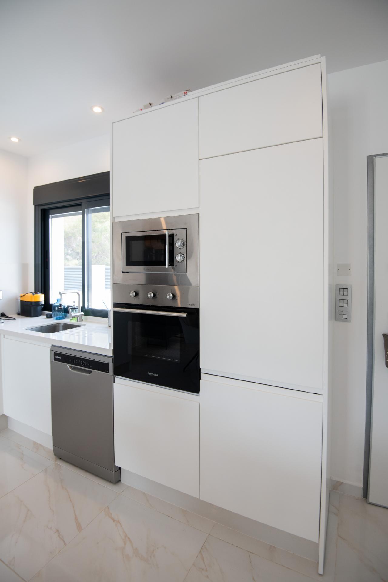 Kitchen and dining area showing fitted units and open layout, Pinar de Campoverde villa